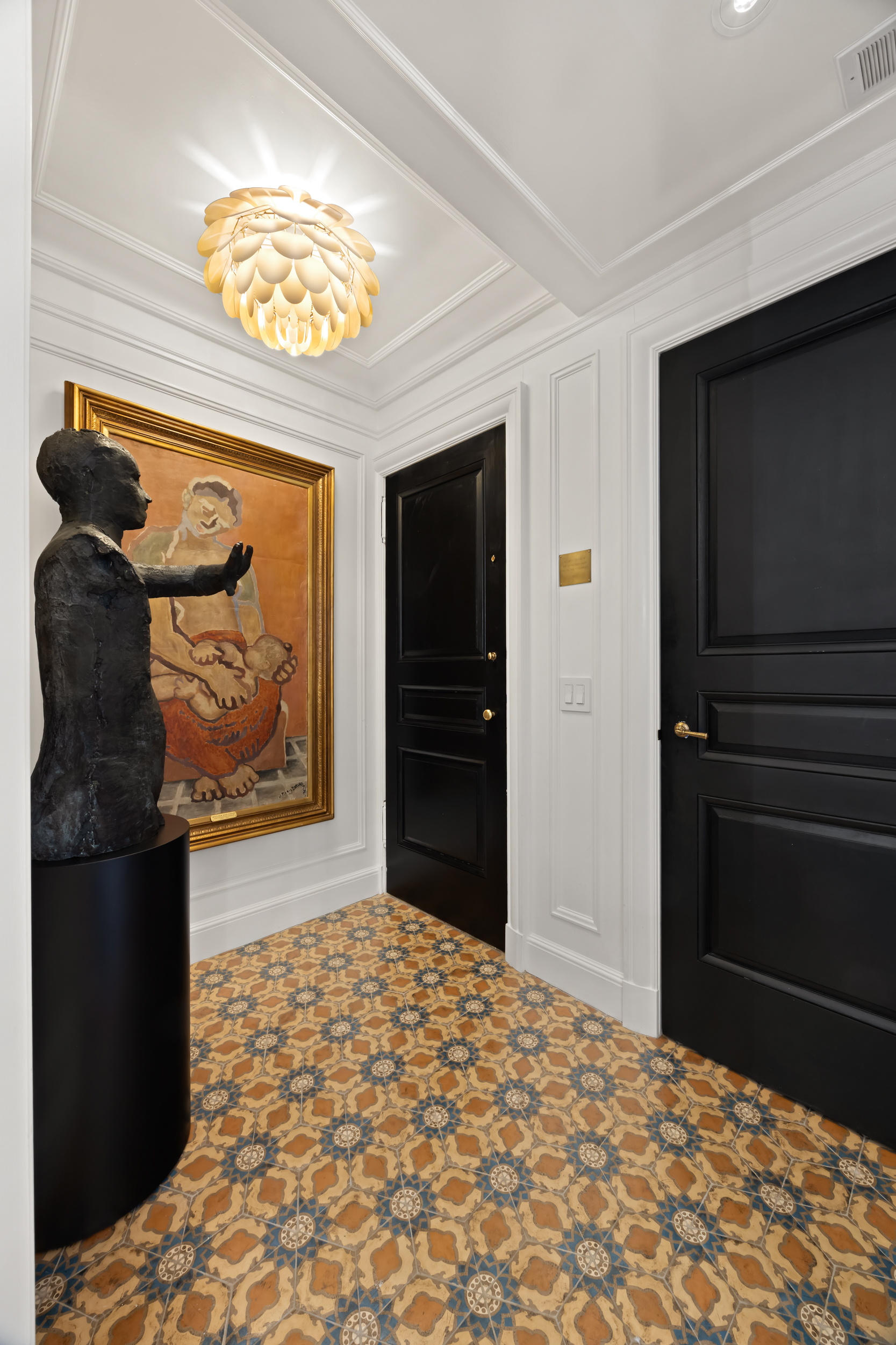 170 East 78th Street, Unit 8E Manhattan, NY 10075 - Photo 15 of 16 a bedroom with a bed and a television