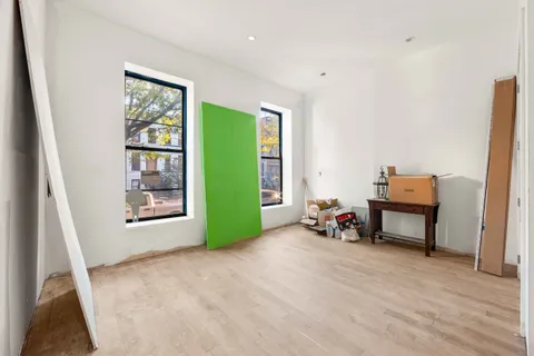 a room with furniture and a window