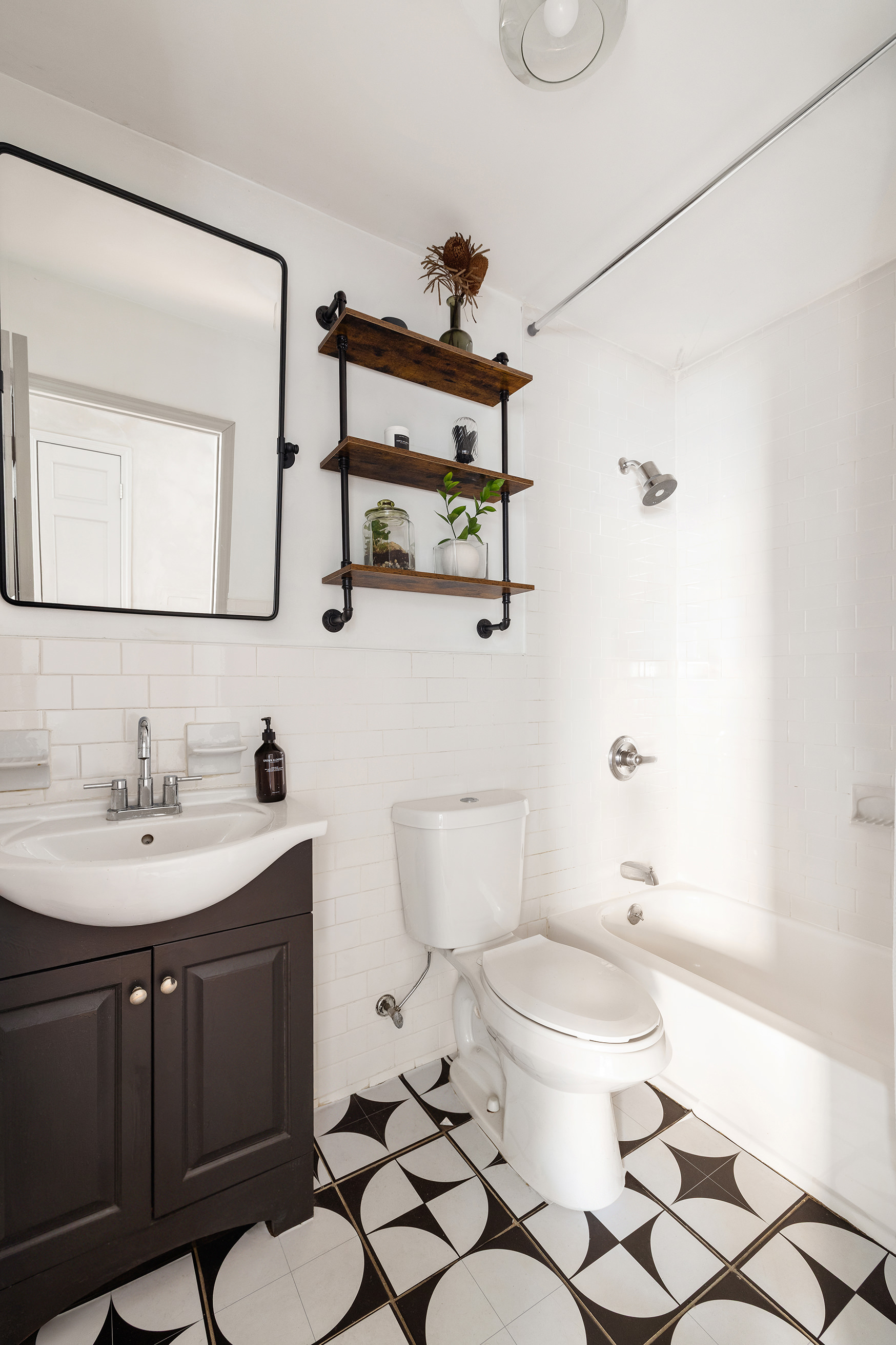 68 Dikeman Street Brooklyn, NY 11231 - Photo 13 of 17 a bathroom with a sink a toilet and a mirror