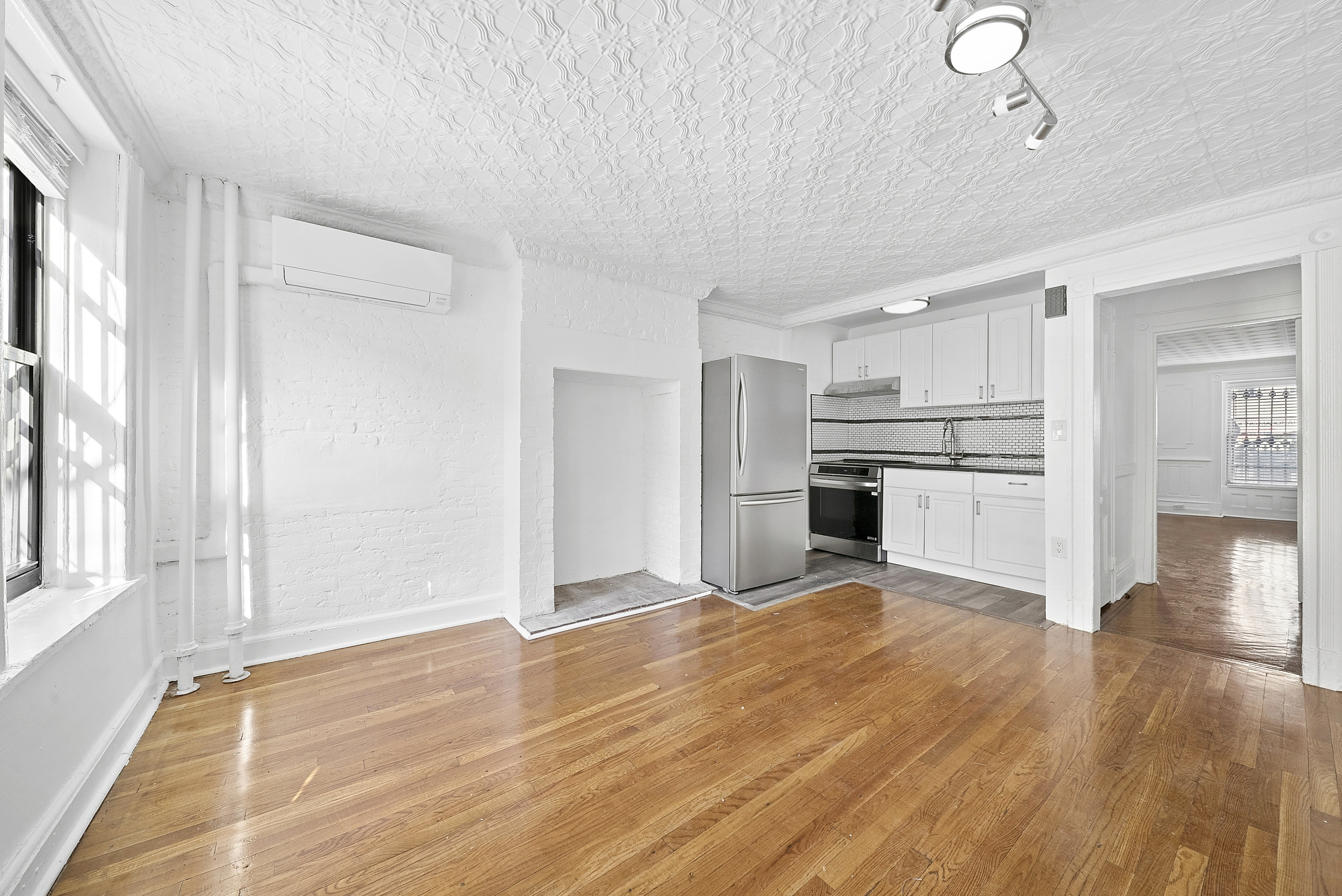 490 A Monroe Street, Unit apt.1 Brooklyn, NY 11221 - Photo 4 of 12 a view of kitchen with wooden floor