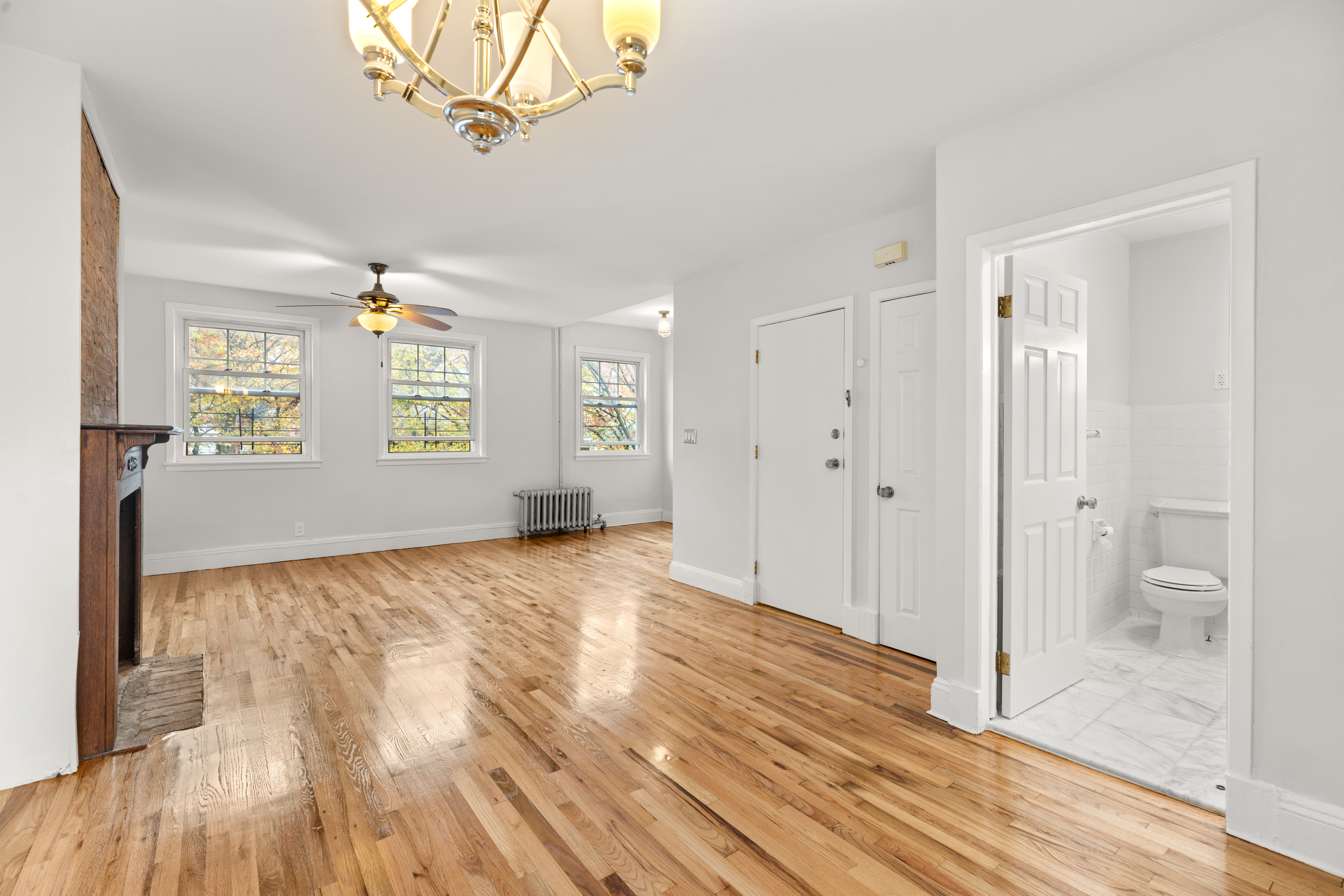 180 East 5th Street, Unit 2 Brooklyn, NY 11218 - Photo 2 of 14 a view of an empty room and window