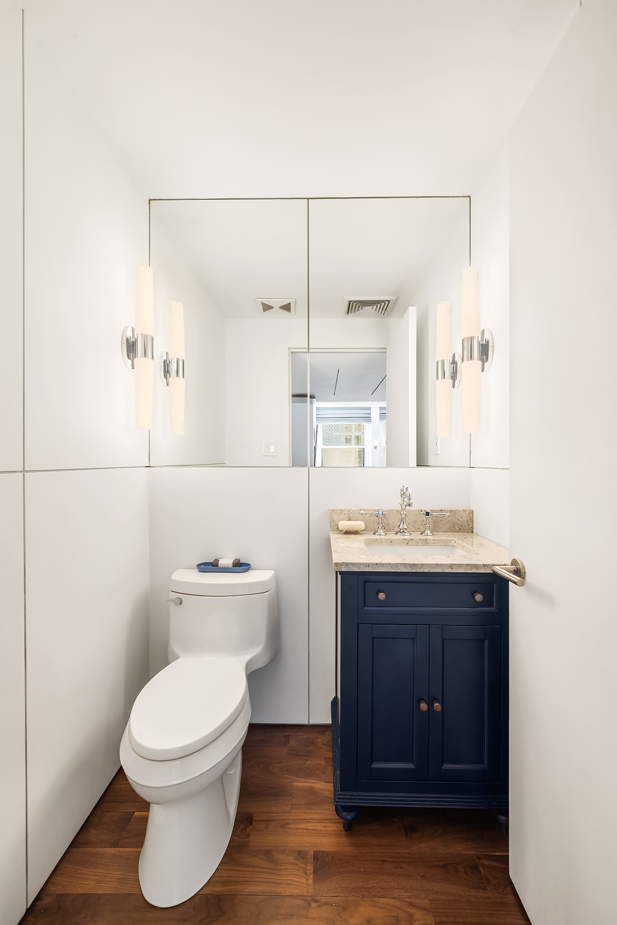 315 West 36th Street, Unit 11D Manhattan, NY 10018 - Photo 8 of 10 a bathroom with a sink and a toilet