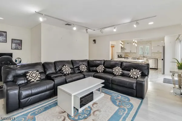 a living room with furniture and a couch