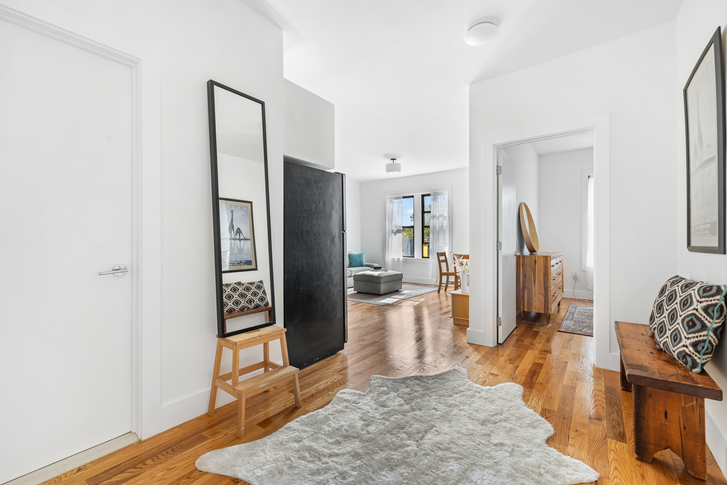 839 East 19th Street, Unit 4D Brooklyn, NY 11230 - Photo 5 of 10 a view of a kitchen with refrigerator and wooden floor
