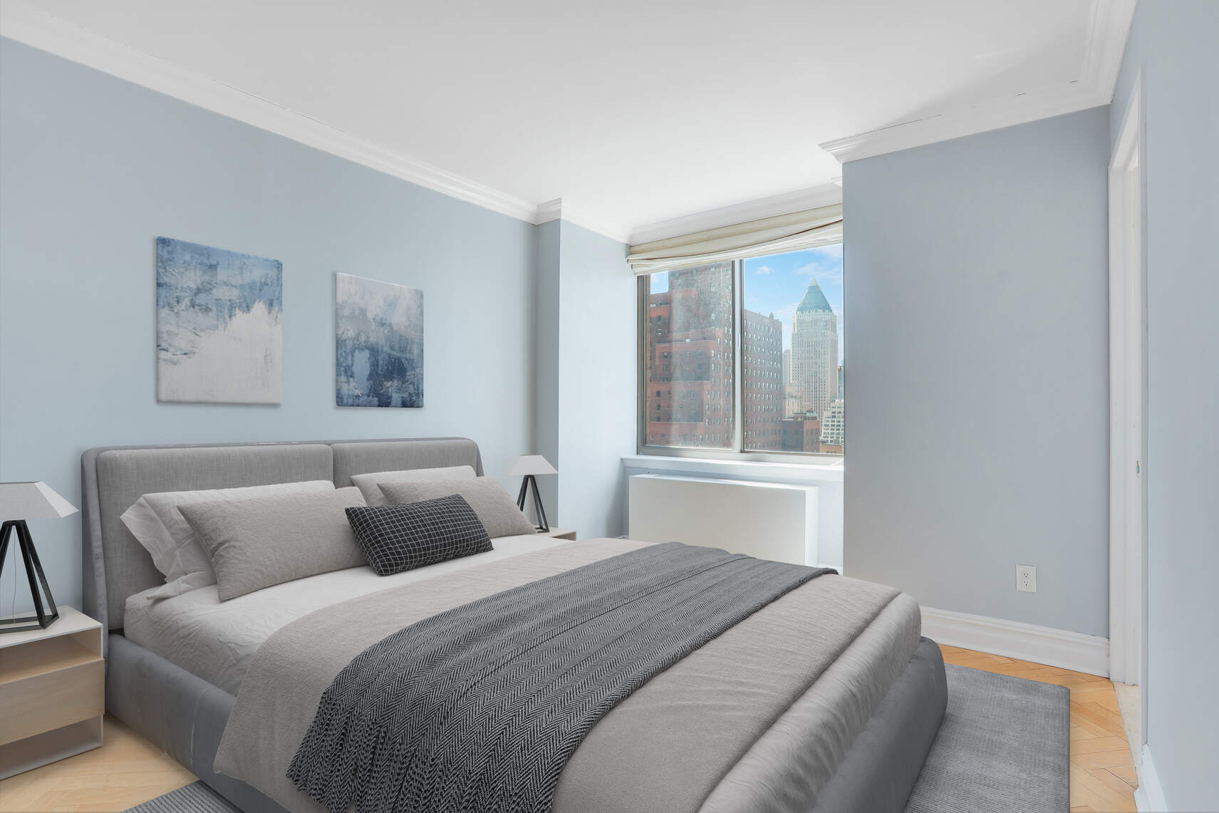 2 Columbus Avenue, Unit 17C Manhattan, NY 10023 - Photo 8 of 26 a bedroom with a large bed and a window