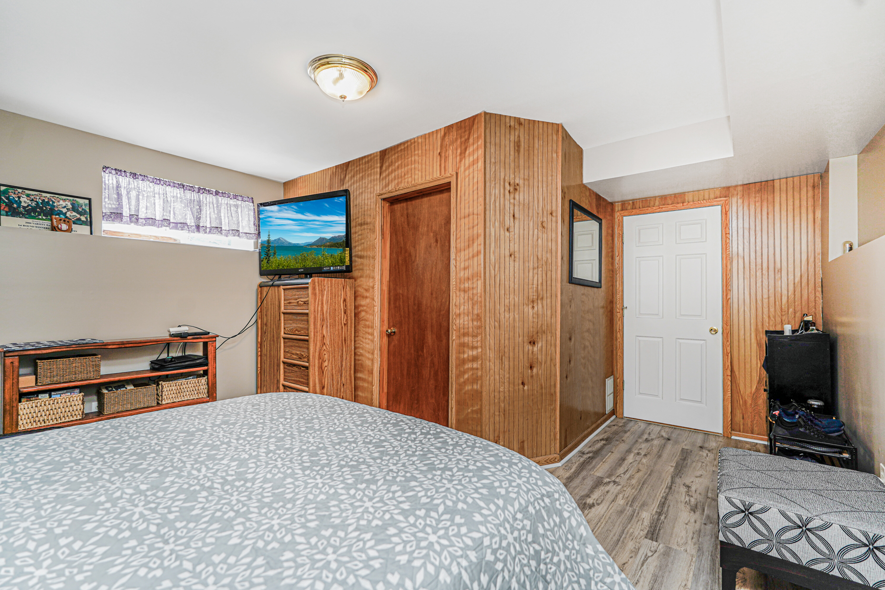 287 Greaves Avenue Staten Island, NY 10308 - Photo 25 of 35 a bedroom with a bed and a dresser