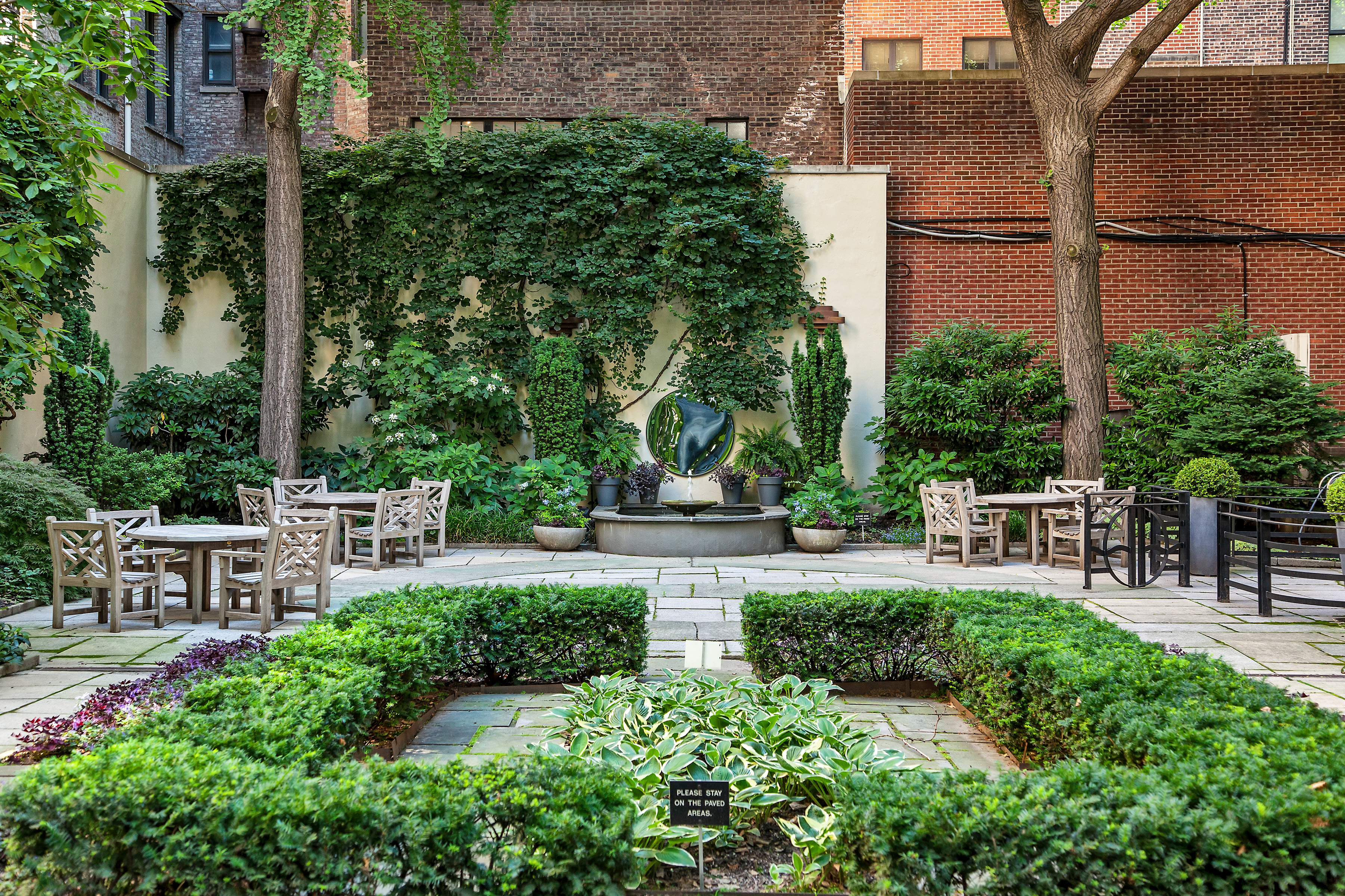 235 East 22nd Street, Unit 2R Manhattan, NY 10010 - Photo 9 of 15 a view of a chair and table in backyard