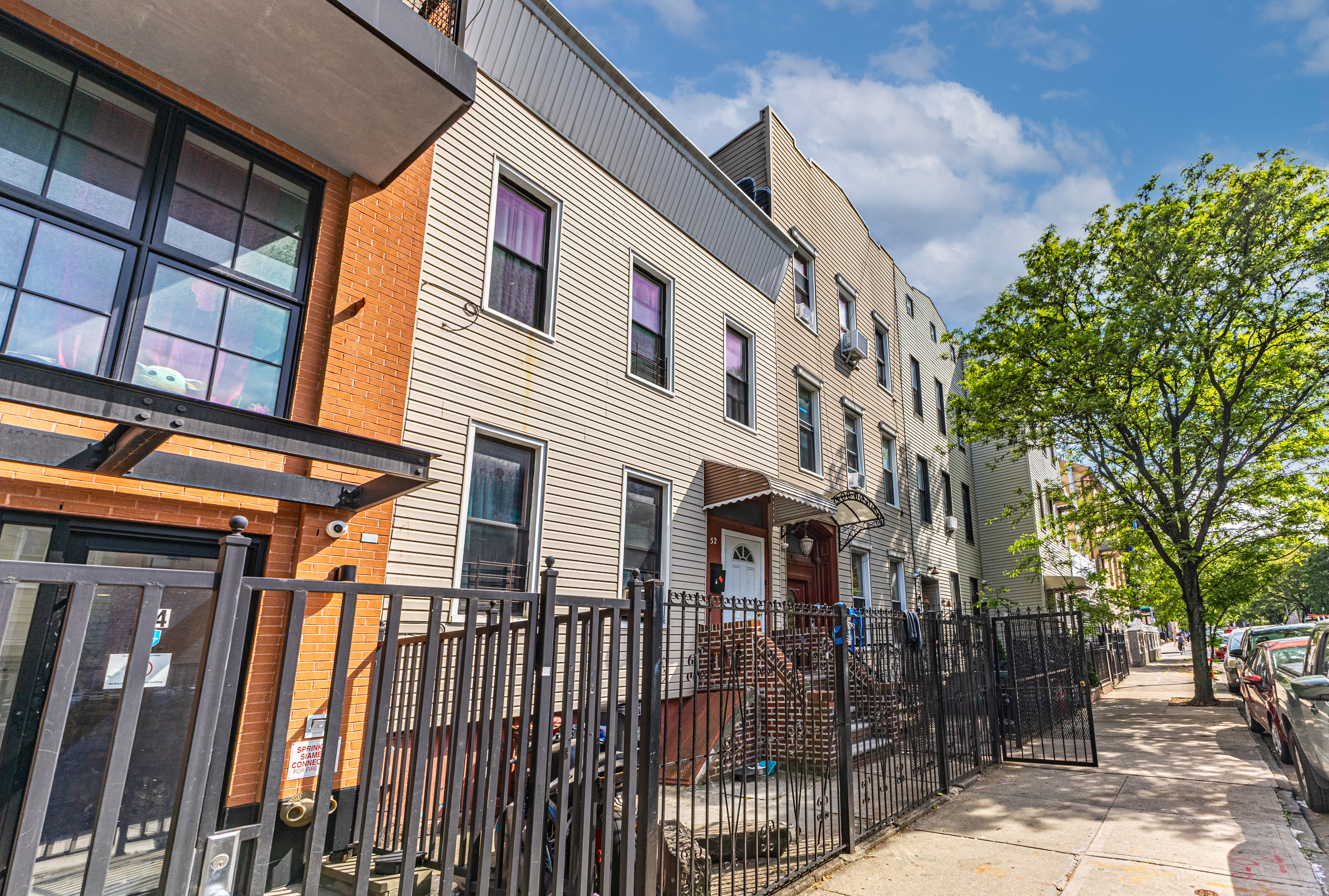 52 Himrod Street Brooklyn, NY 11221 - Photo 9 of 16 a view of a building with a street
