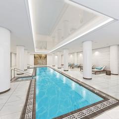 21 Clark Street, Unit 1201 Brooklyn, NY 11201 - Photo 7 of 11 a kitchen with sink refrigerator and cabinets