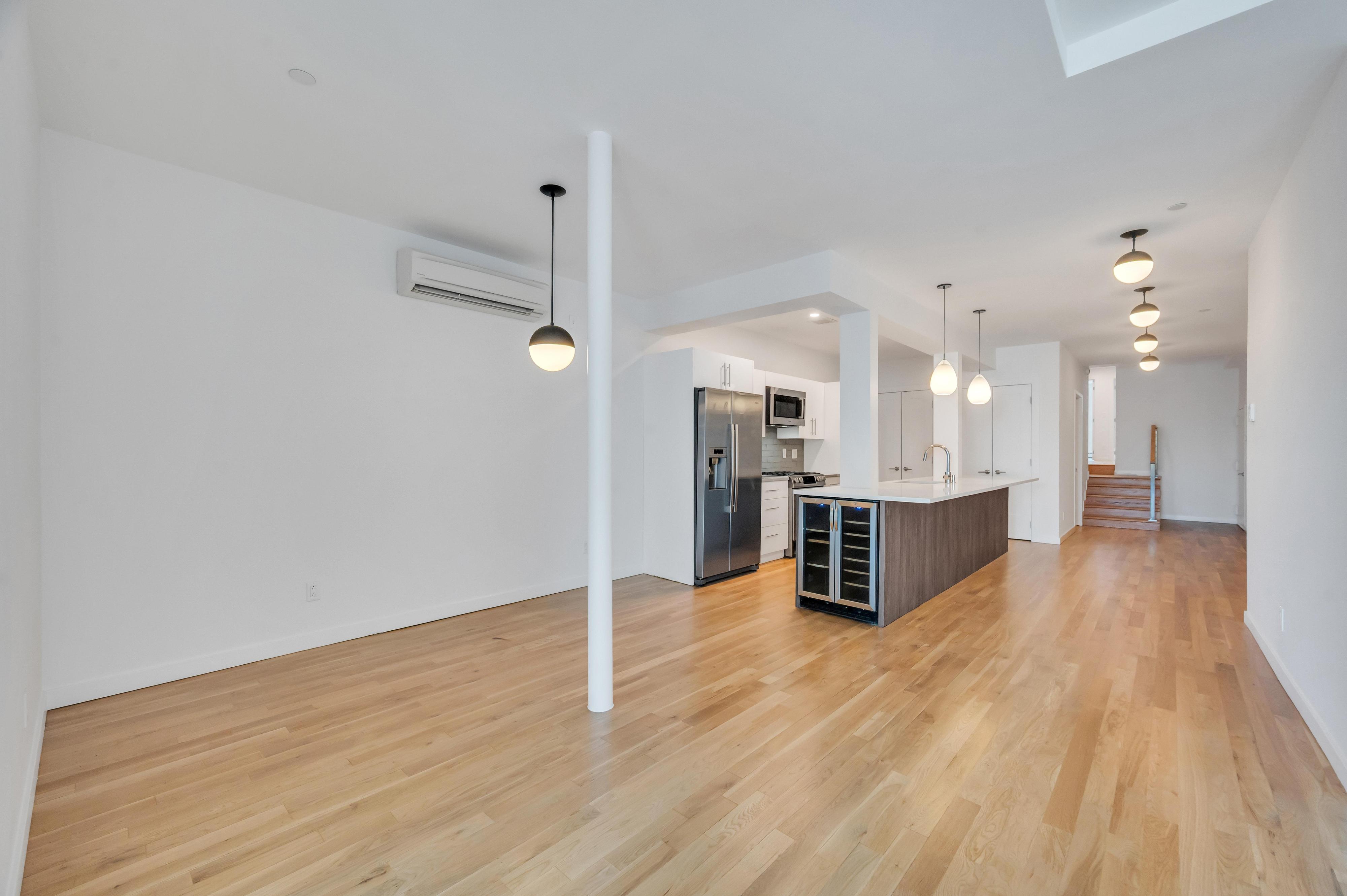 717 Manhattan Avenue, Unit 3A Brooklyn, NY 11222 - Photo 6 of 18 a view of kitchen with wooden floor