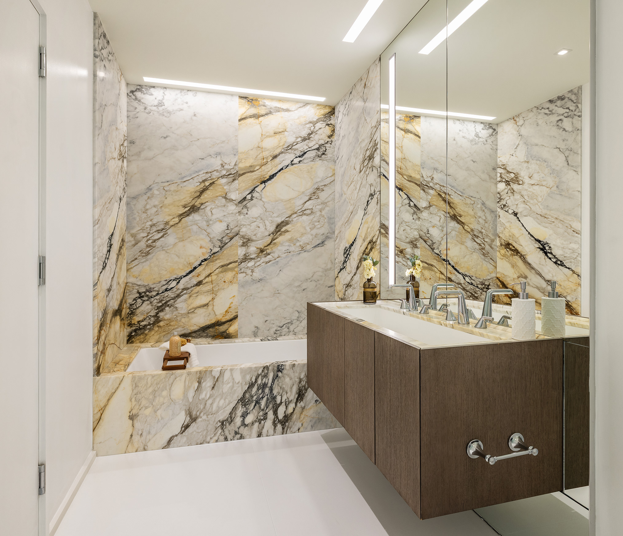 121 East 22nd Street, Unit S603 Manhattan, NY 10010 - Photo 7 of 12 a bathroom with a bathtub and shower
