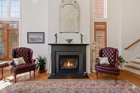 a living room with furniture or couch and a large window