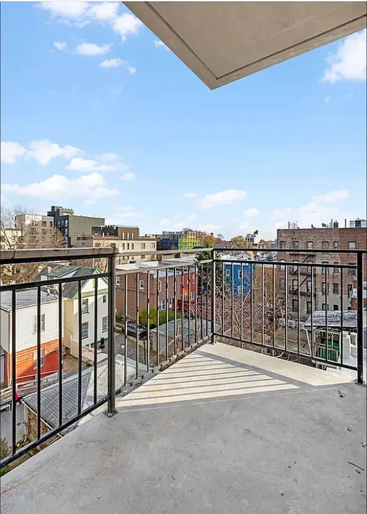 a view of a terrace with a bench