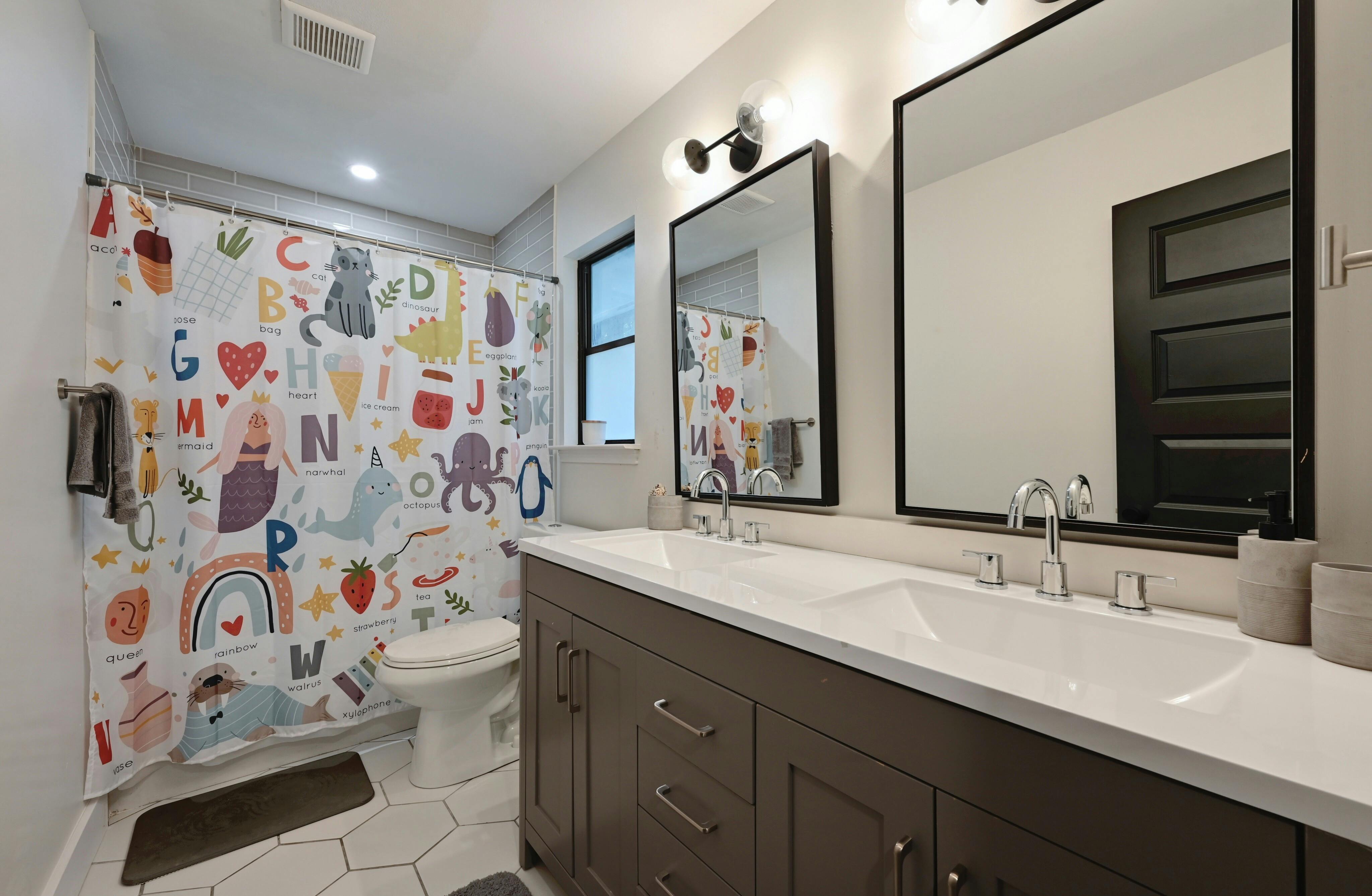 Address Upon Request Austin, TX 78745 - Photo 16 of 19 a bathroom with a sink a vanity and a mirror