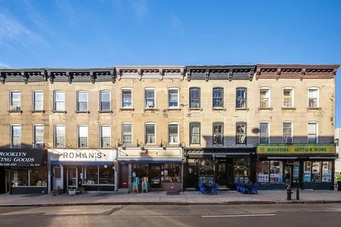 a view of a building with a terrace