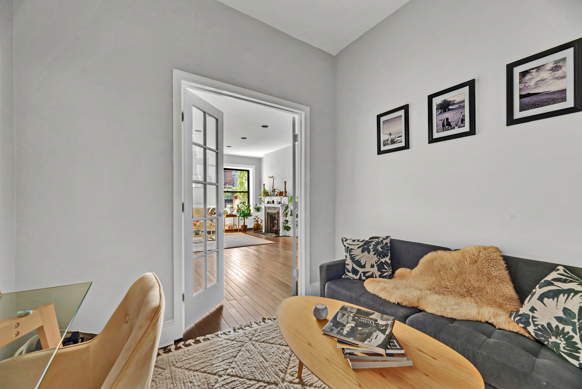 72 East 93rd Street, Unit 5AB Manhattan, NY 10128 - Photo 6 of 17 a bedroom with furniture and a wooden floor