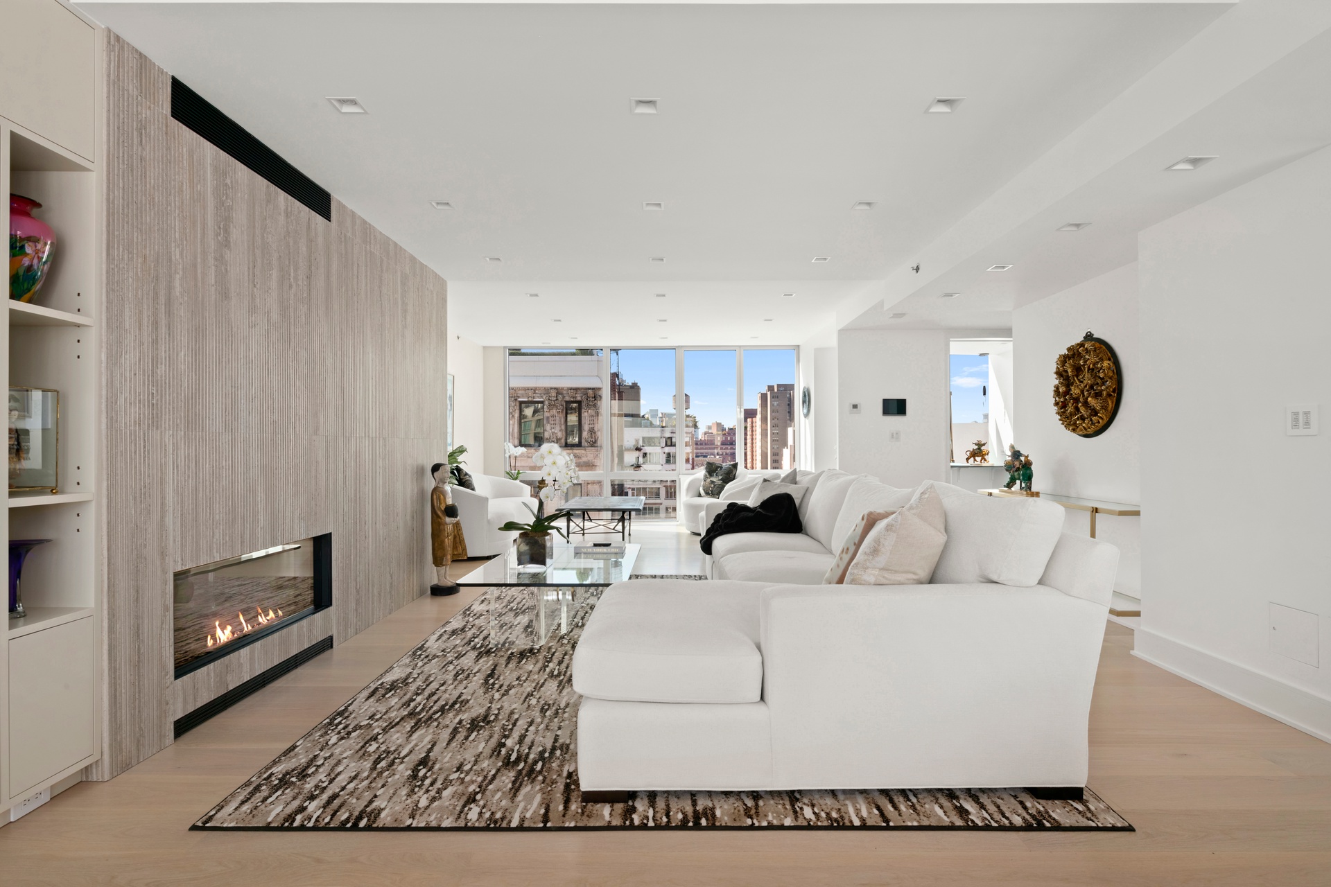 151 West 17th Street, Unit PHF Manhattan, NY 10011 - Photo 5 of 19 a living room with furniture and a rug