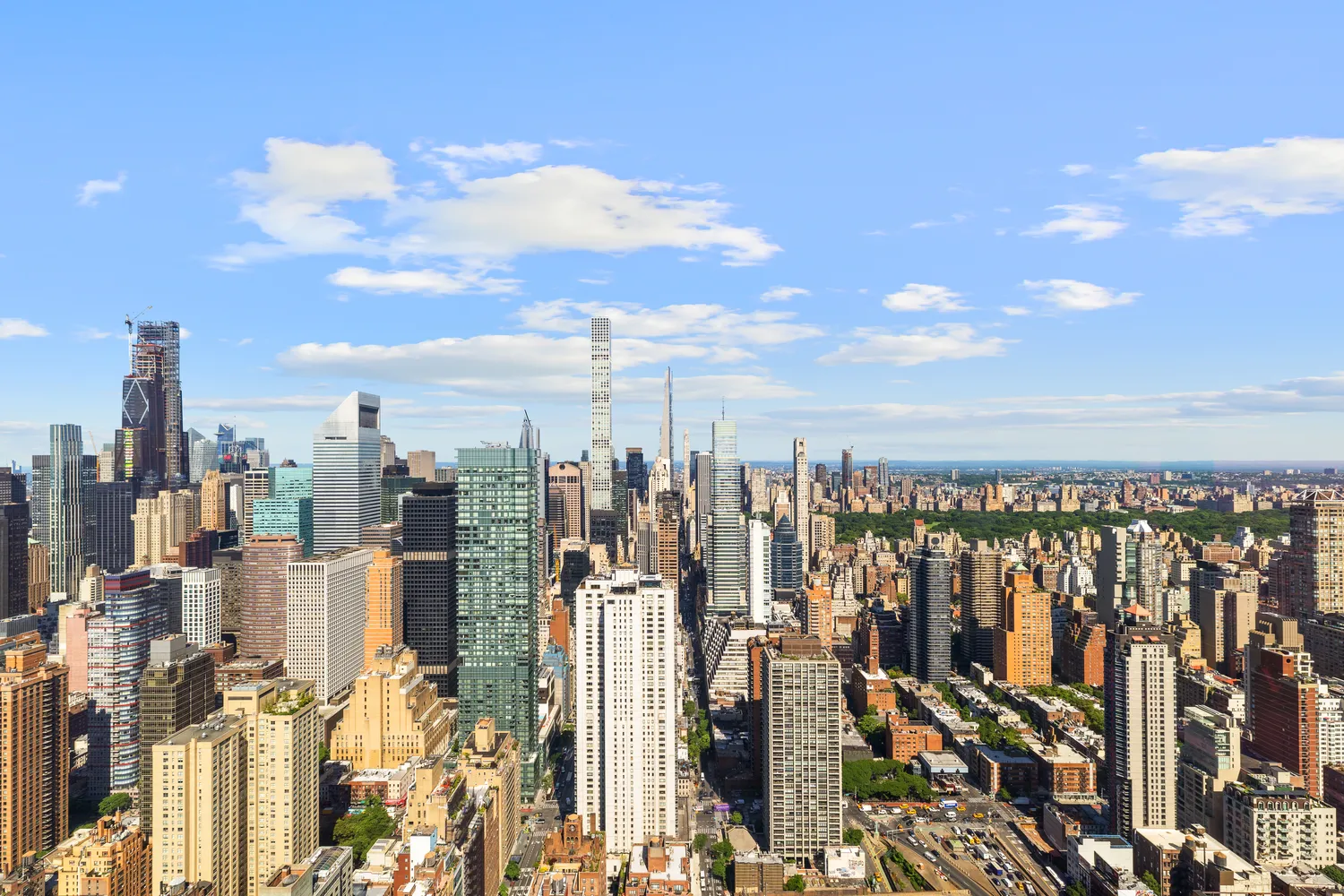 a view of a city with tall buildings