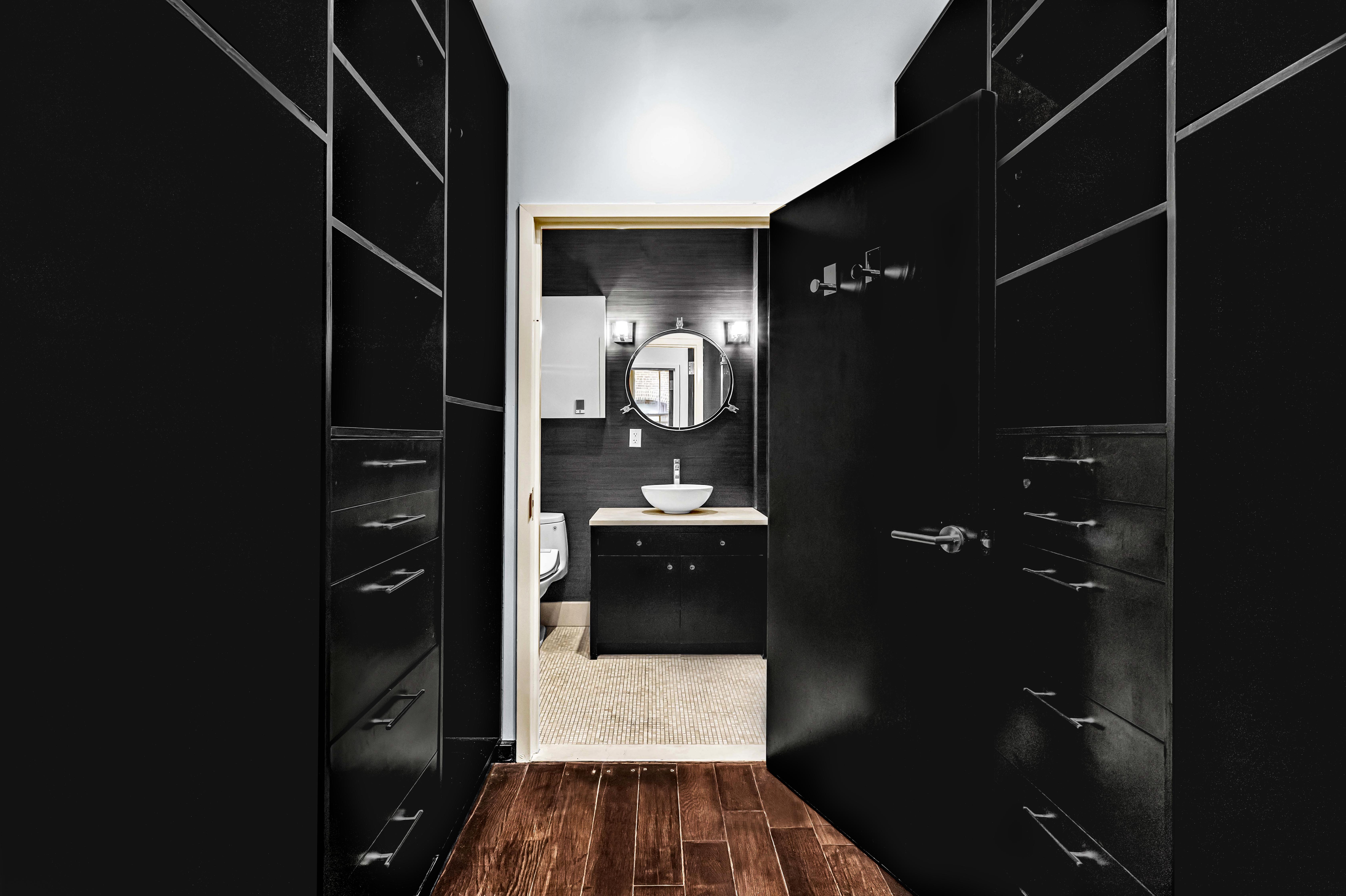 175 Franklin Street, Unit 4 Manhattan, NY 10013 - Photo 5 of 13 a bathroom with a sink