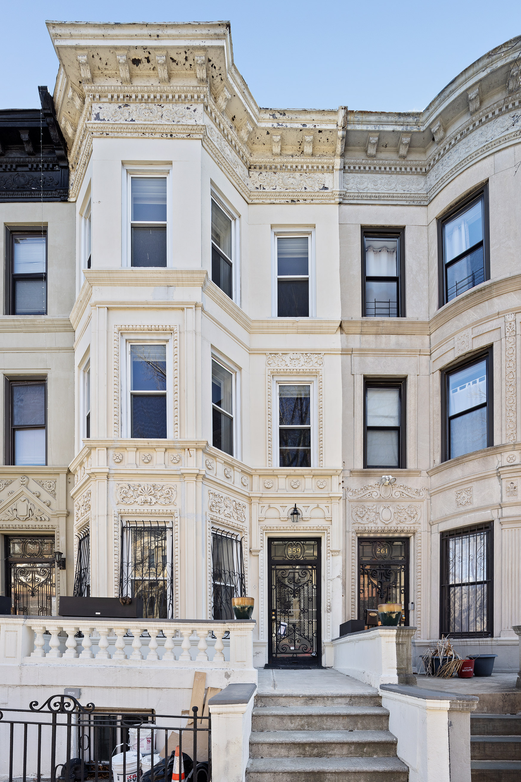 259 New York Avenue Brooklyn, NY 11216 - Photo 23 of 25 a large building with a lot of windows