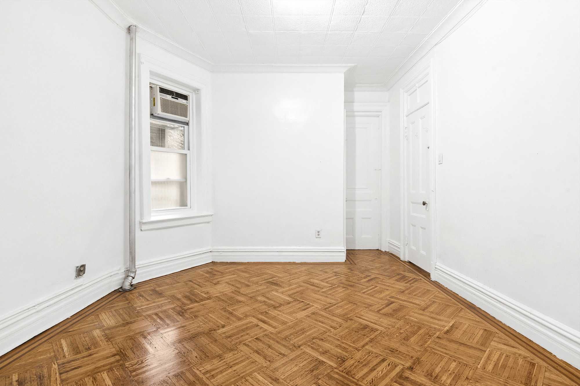 271 6th Avenue, Unit 2 Brooklyn, NY 11215 - Photo 3 of 8 a view of empty room with window