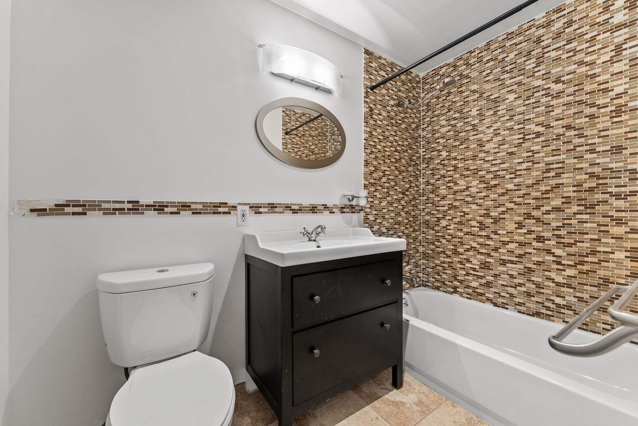 2573 Frederick Douglass Boulevard, Unit D Manhattan, NY 10030 - Photo 10 of 13 a bathroom with a toilet and a sink