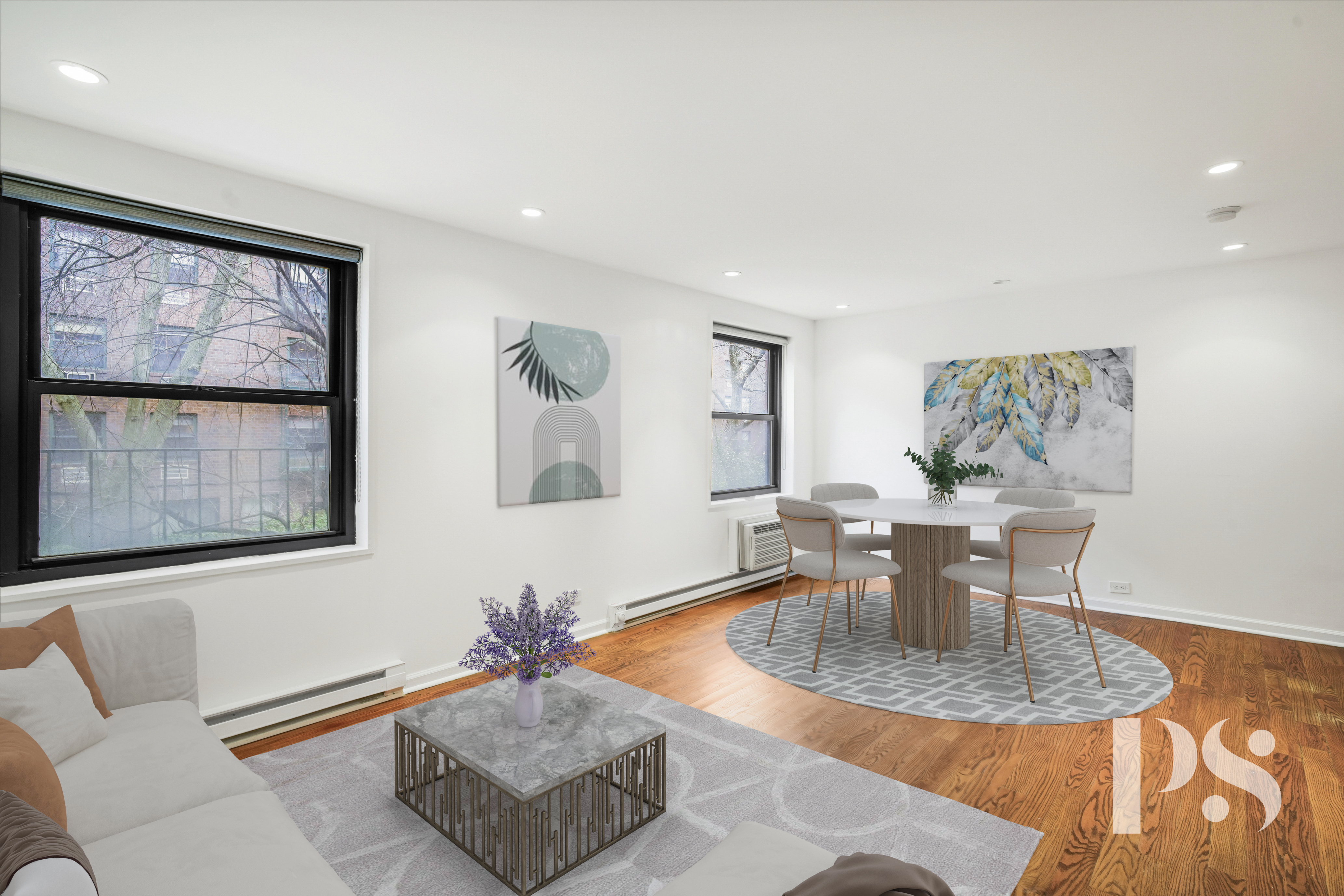 133 Barrow Street, Unit 1B Manhattan, NY 10014 - Photo 3 of 11 a living room with furniture a window and a table