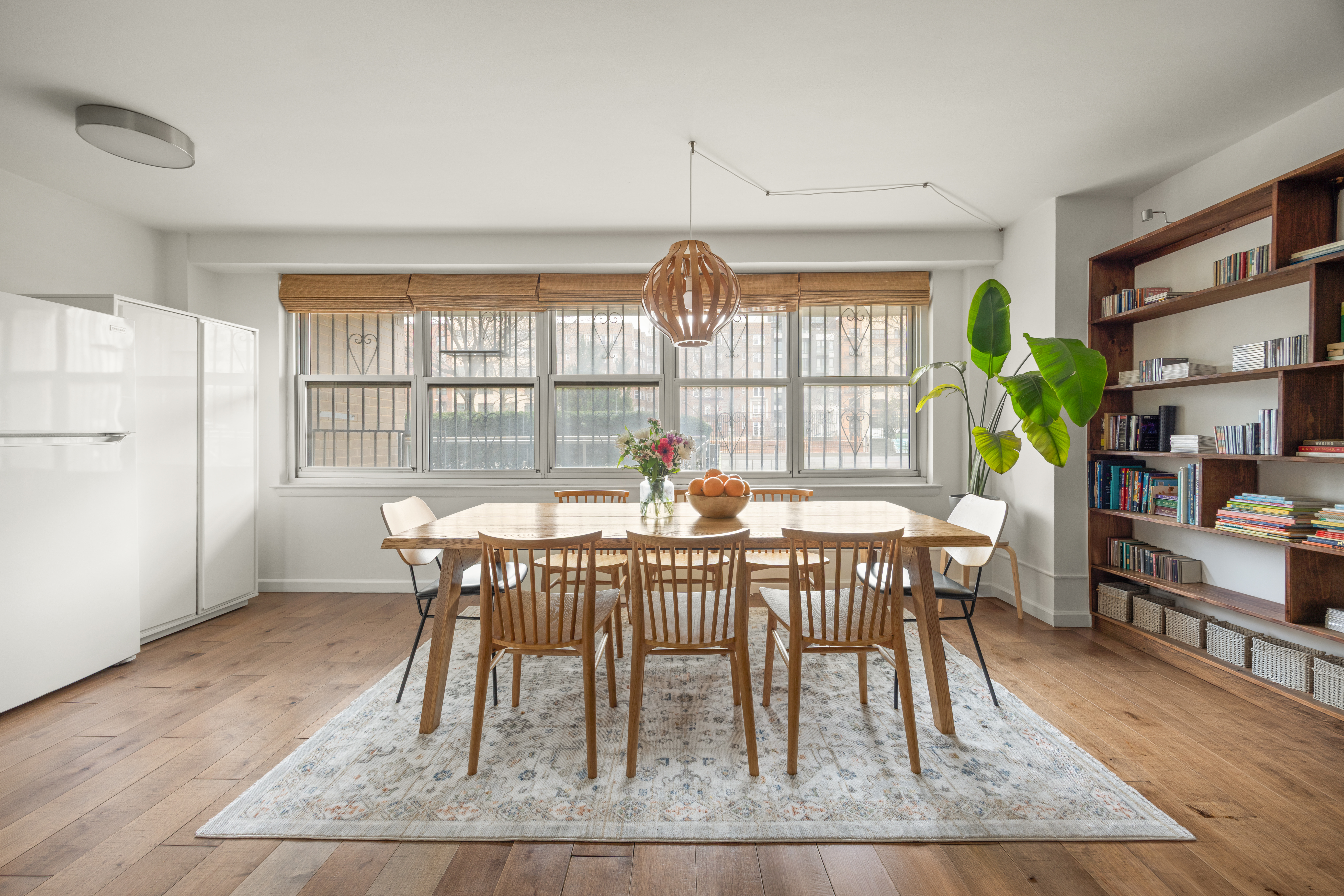 135 Ocean Parkway, Unit 1M Brooklyn, NY 11218 - Photo 3 of 11 a view of a dining room with furniture window and wooden floor