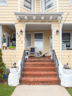 a view of a patio with couches and chairs