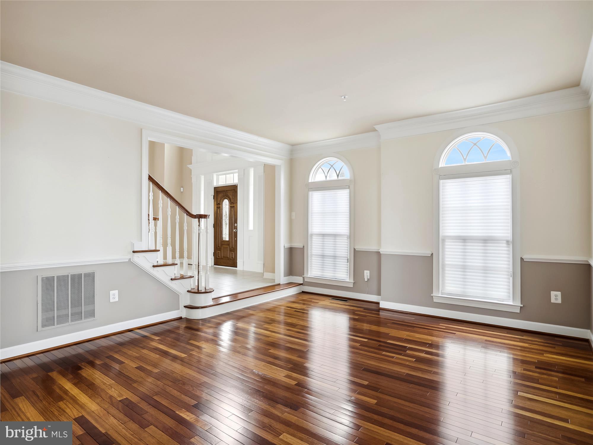 14302 Derby Ridge Road Bowie, MD 20721 - Photo 24 of 67 a view of an empty room with wooden floor and a window
