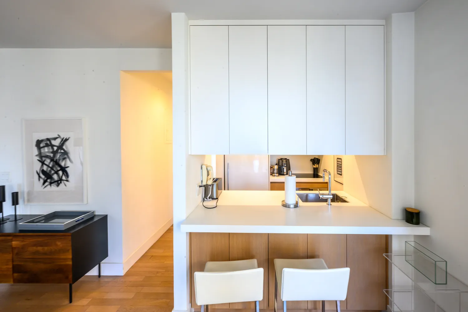 a kitchen with a sink a stove and a cabinets
