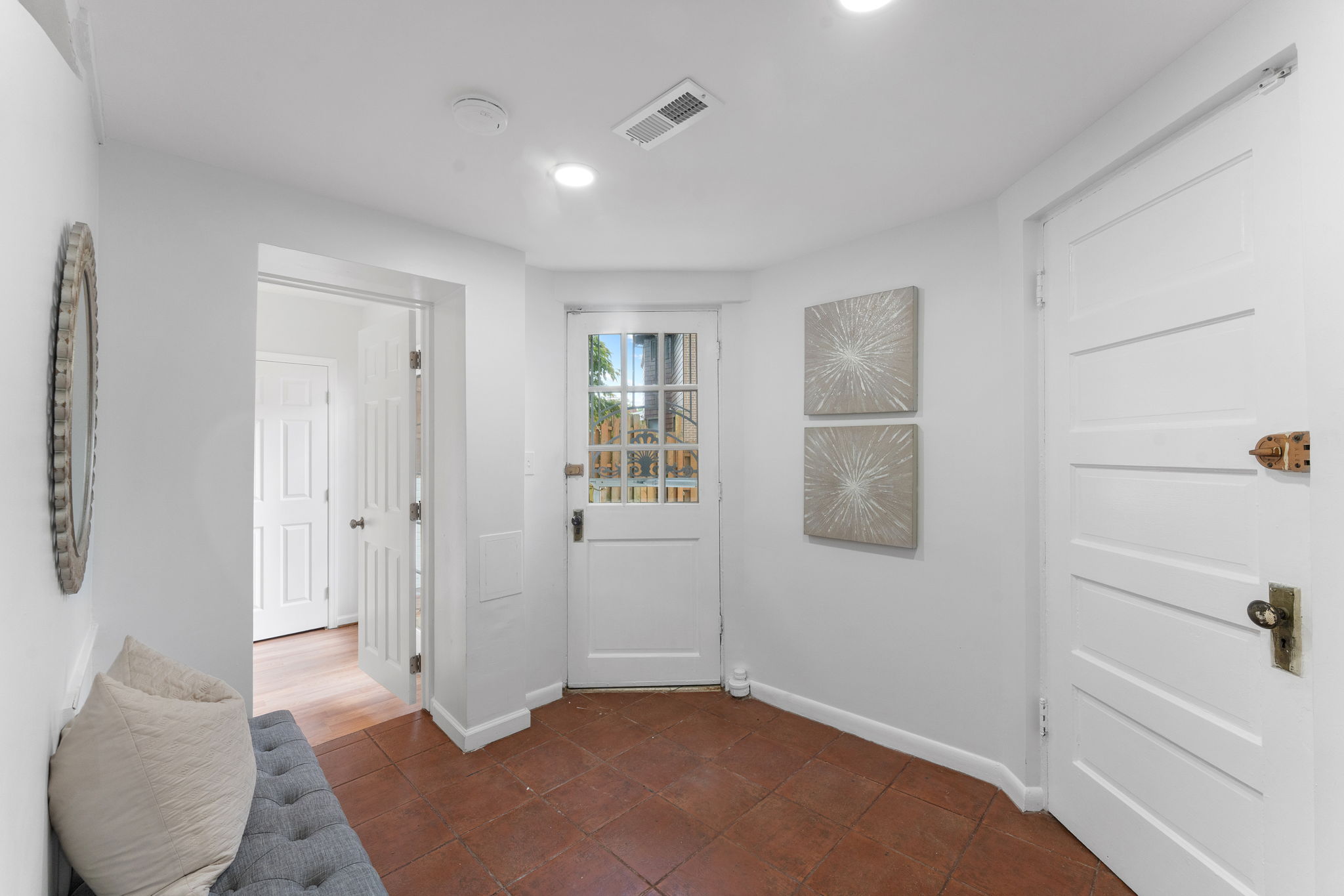 1325 Locust Road Northwest Washington, DC 20012 - Photo 49 of 56 a view of livingroom with hardwood floor and cabinet