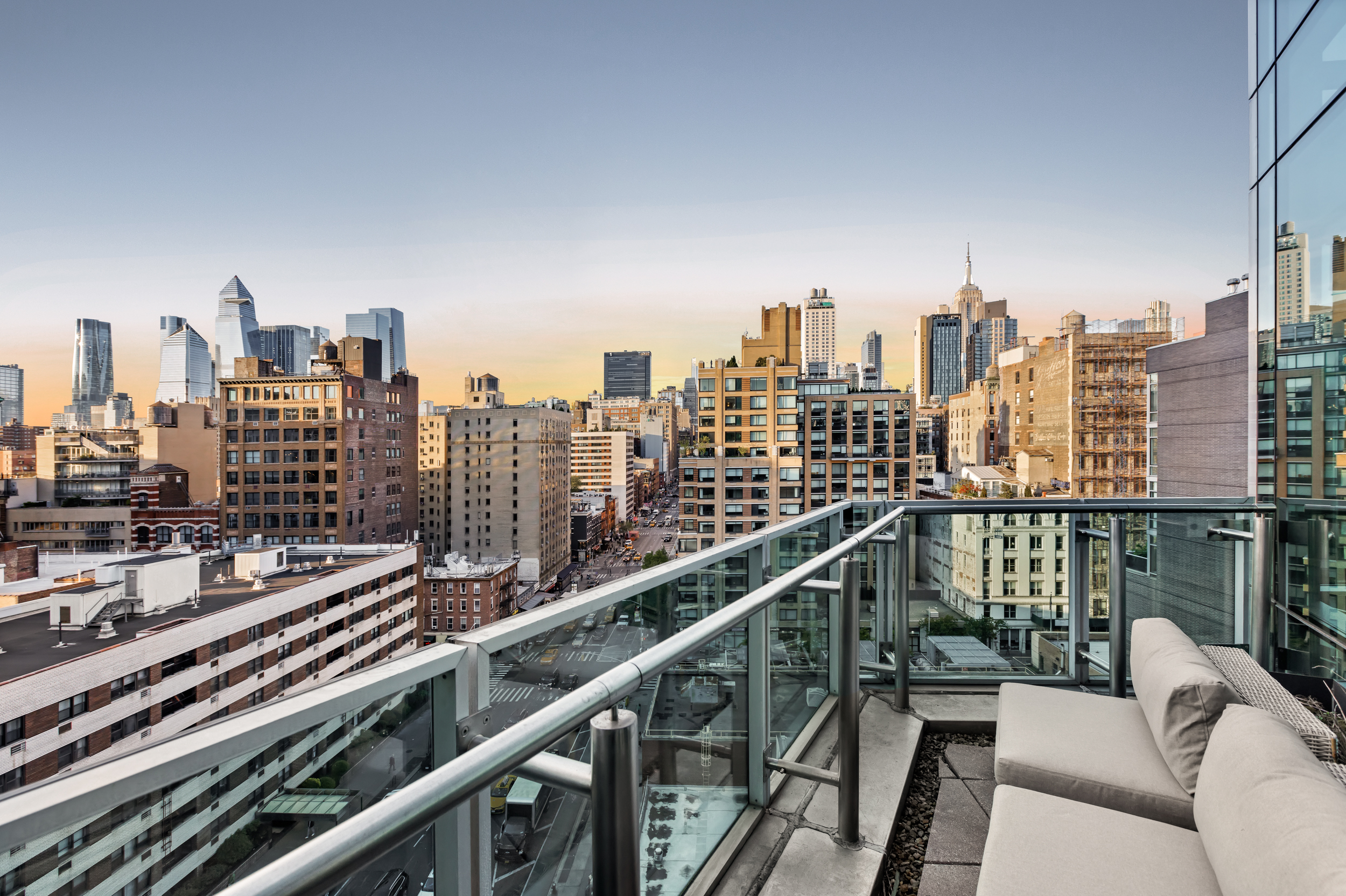 166 West 18th Street, Unit PH11 Manhattan, NY 10011 - Photo 11 of 16 a city view from a balcony
