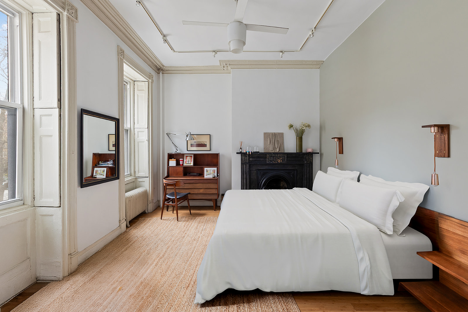 198 6th Avenue Manhattan, NY 10013 - Photo 11 of 45 a bedroom with a bed and wooden floor