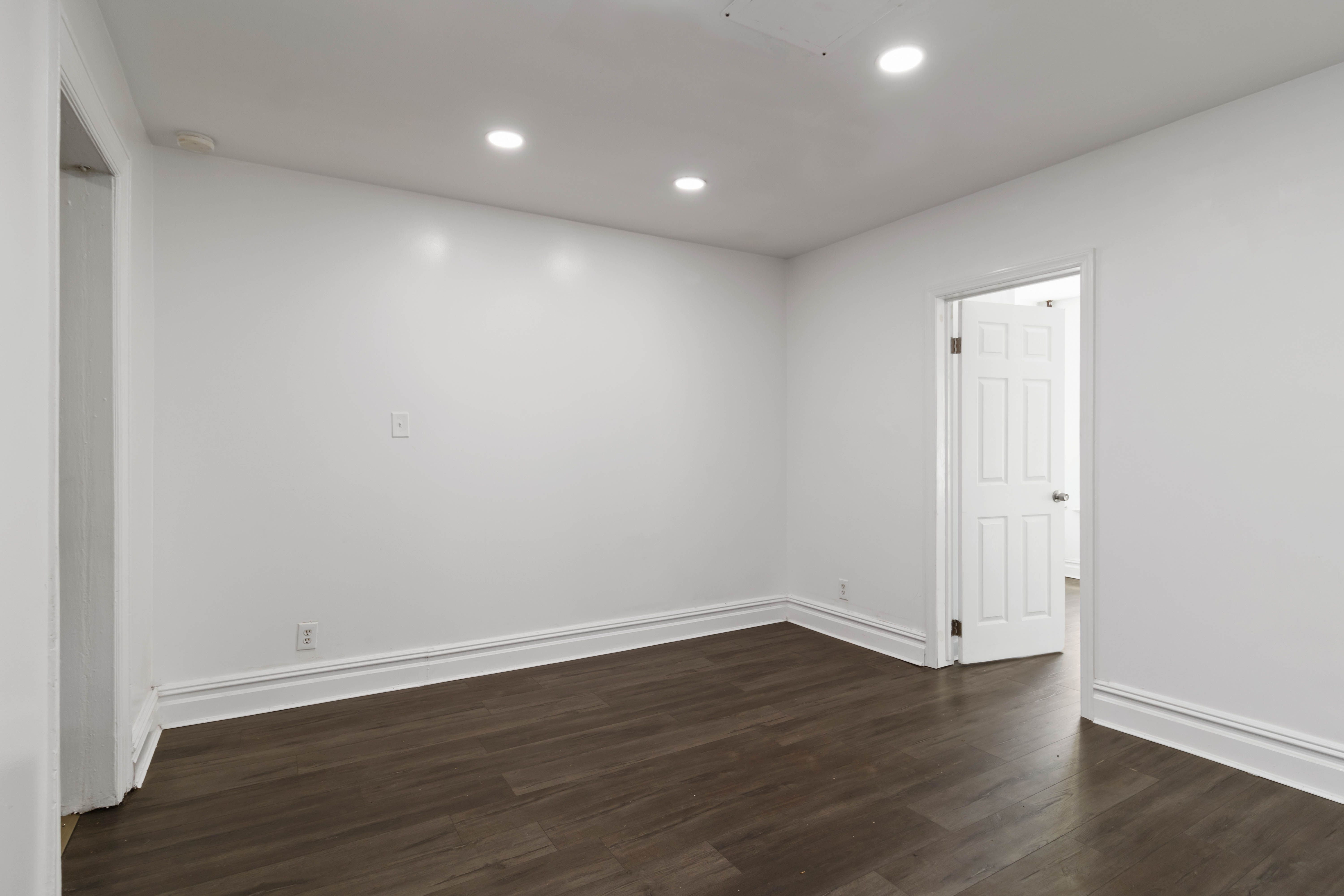 31-24 Steinway Street, Unit 2 Queens, NY 11103 - Photo 8 of 8 a view of a room with wooden floor