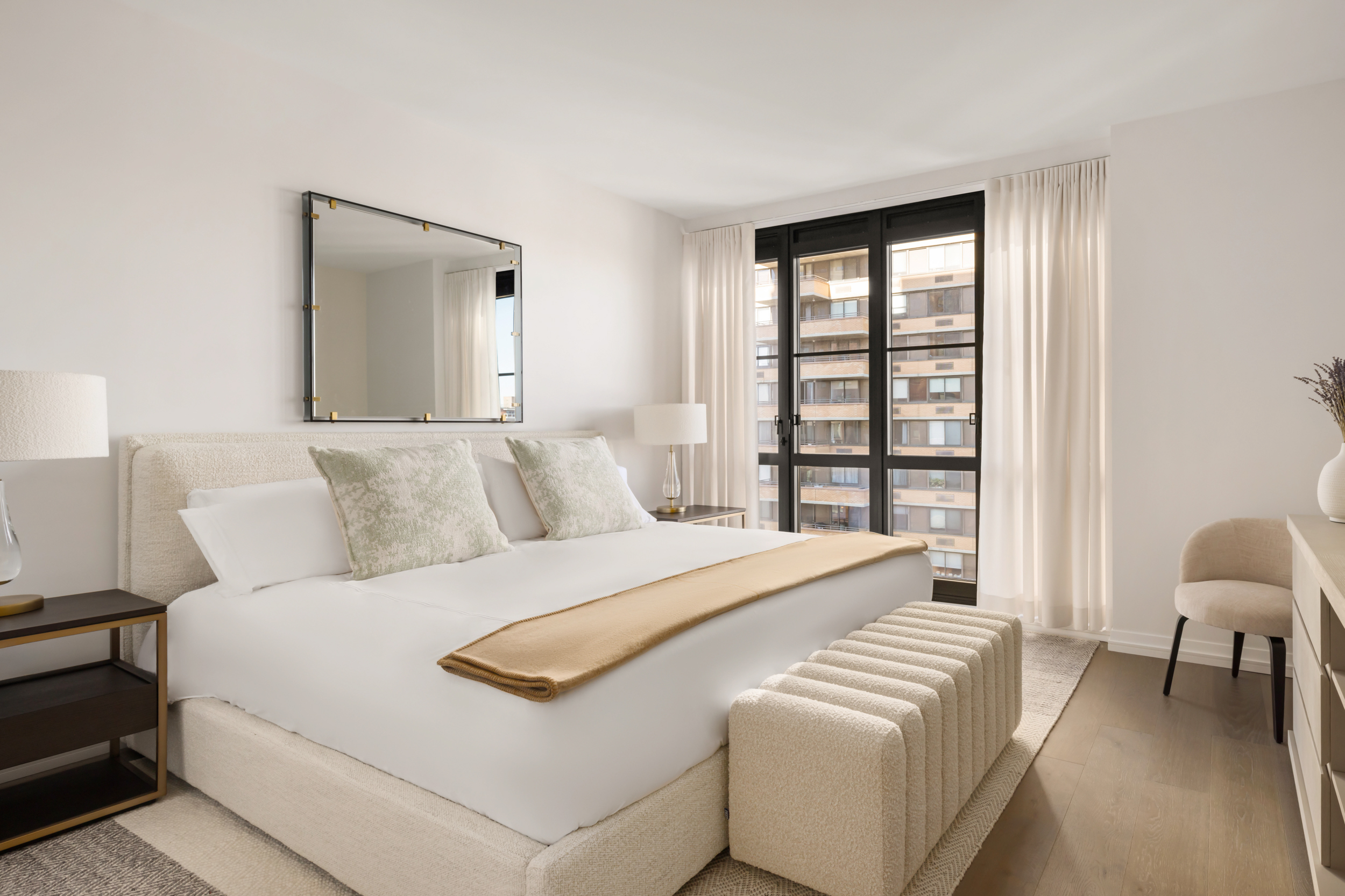 250 West 96th Street, Unit 5D Manhattan, NY 10025 - Photo 5 of 28 a bedroom with a bed and a large window