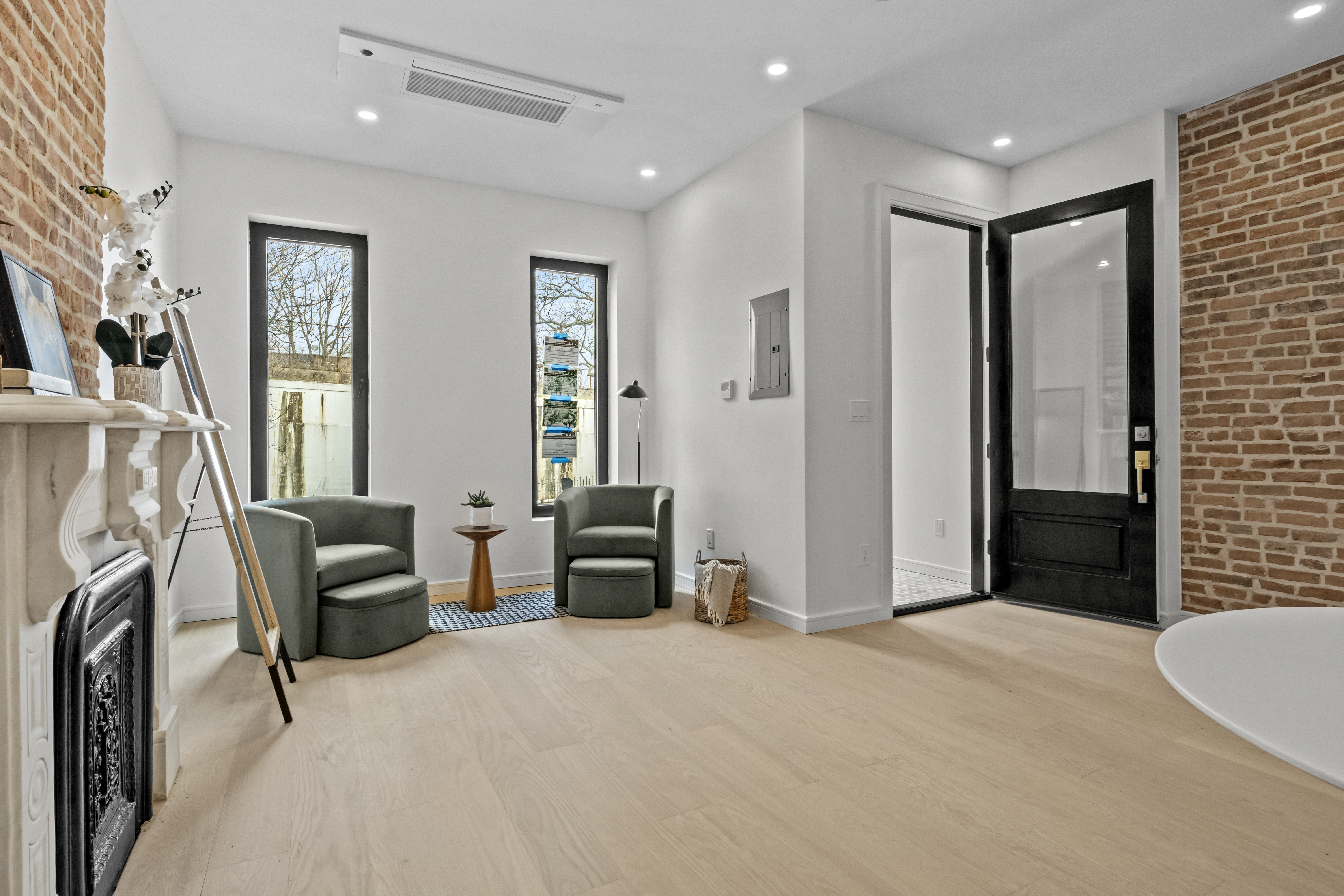 320 10th Street Brooklyn, NY 11215 - Photo 10 of 27 a living room with furniture a window and a couch