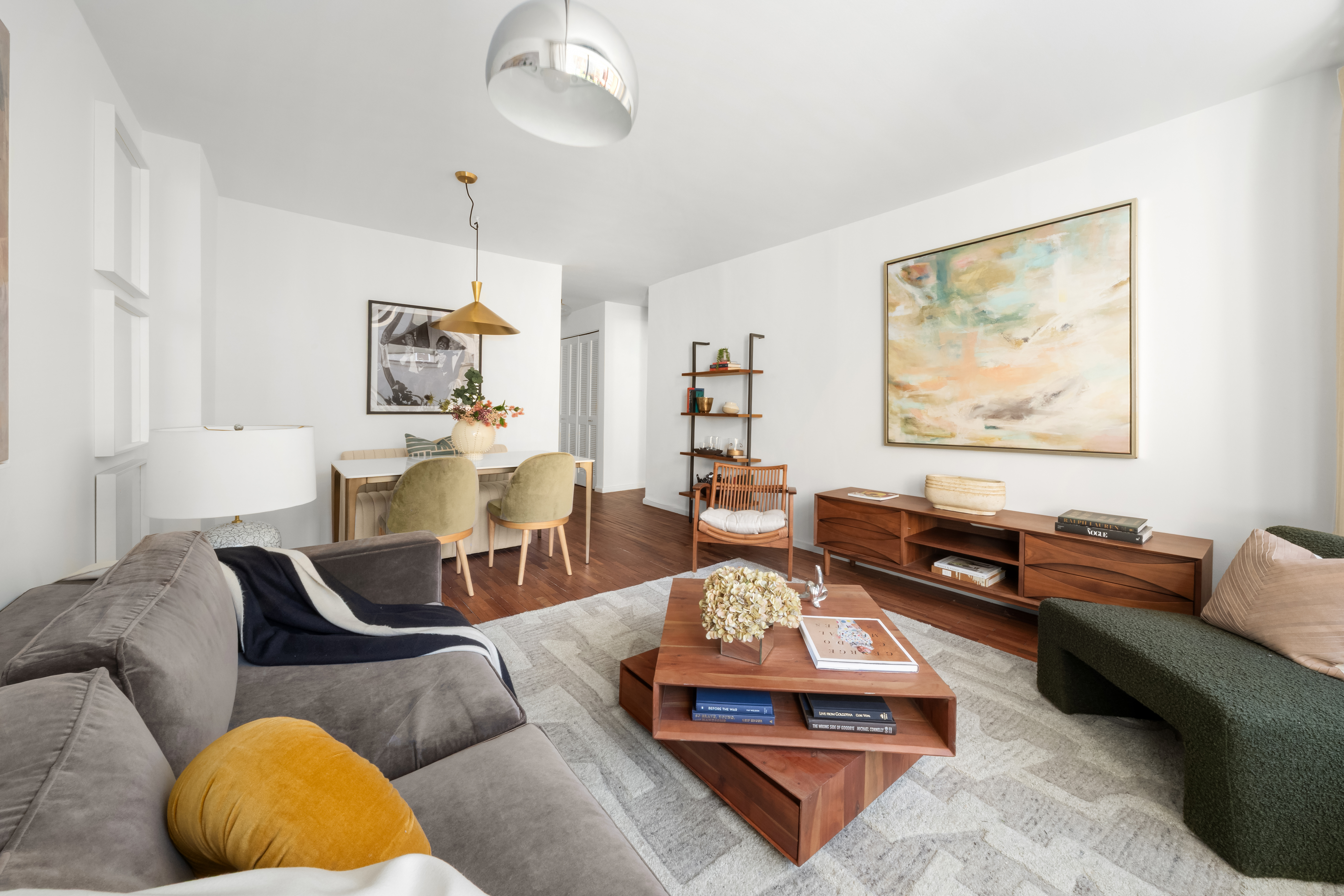150 East 85th Street, Unit 3F Manhattan, NY 10028 - Photo 5 of 15 a living room with furniture rug and window