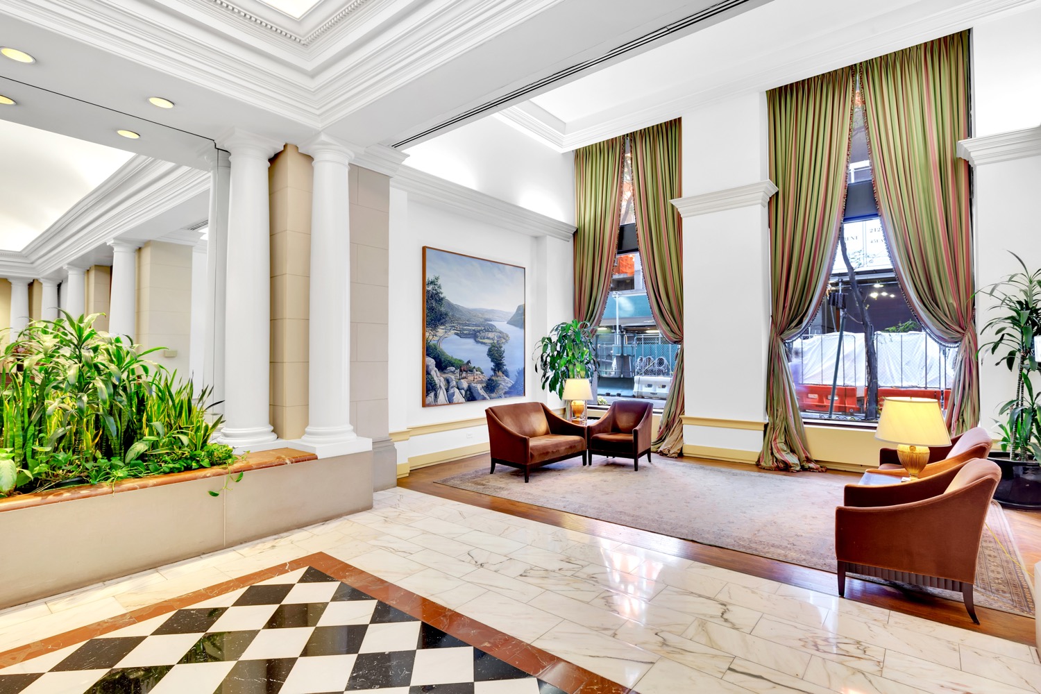280 Park Avenue South, Unit 26M Manhattan, NY 10010 - Photo 12 of 14 a living room with furniture and a potted plant