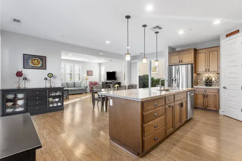 wooden floor in a hall with an entryway