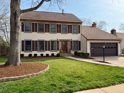 front view of a house with swimming pool