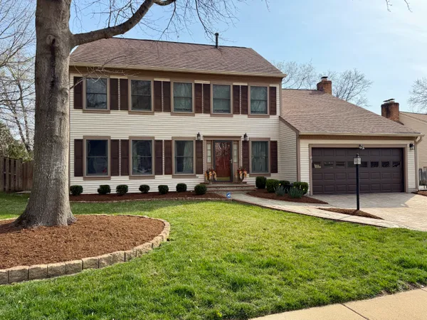 front view of a house with swimming pool