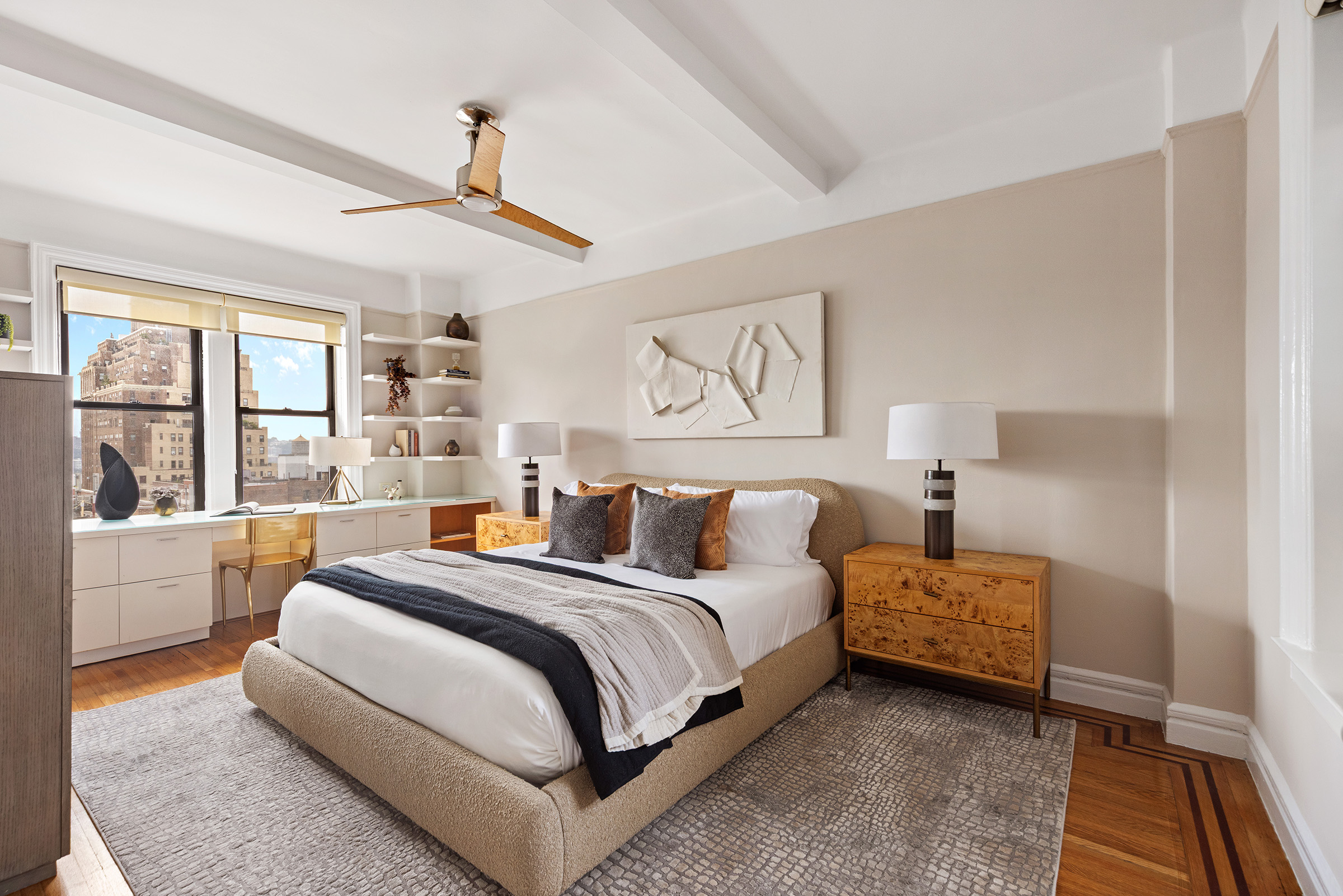 710 West End Avenue, Unit 9A Manhattan, NY 10025 - Photo 4 of 8 a bed room with a bed and a large window