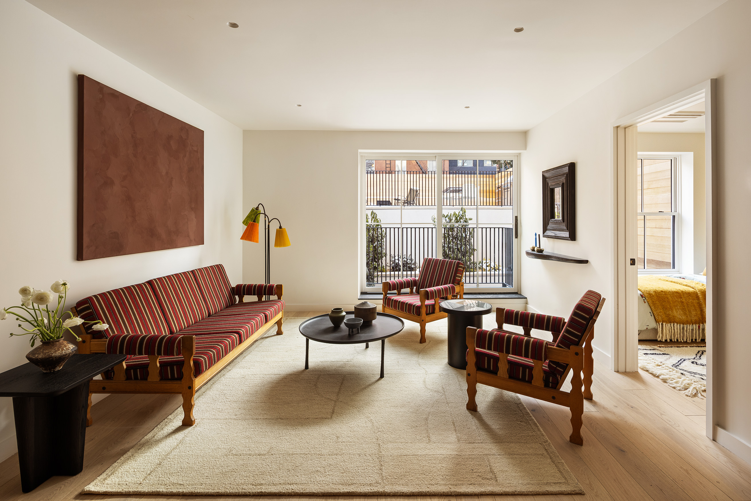 238 Degraw Street, Unit 1 Brooklyn, NY 11231 - Photo 1 of 13 a living room with furniture ceiling fan and a window