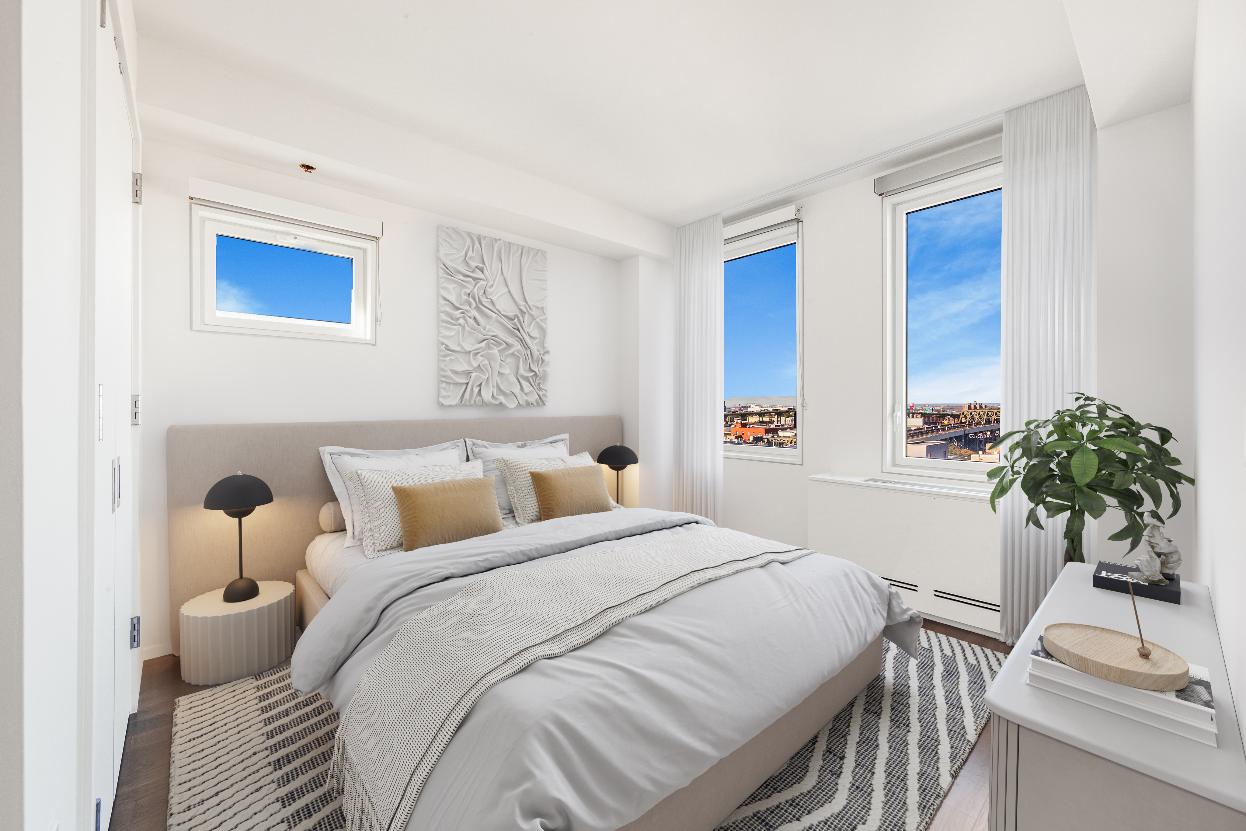 202 8th Street, Unit 4A Brooklyn, NY 11215 - Photo 4 of 16 a bedroom with a bed and a potted plant