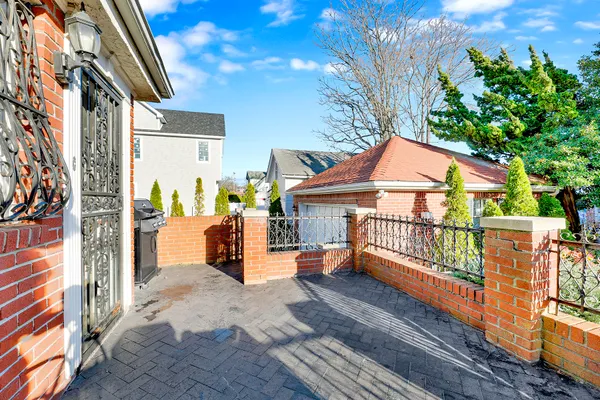 an aerial view of residential building and swimming pool