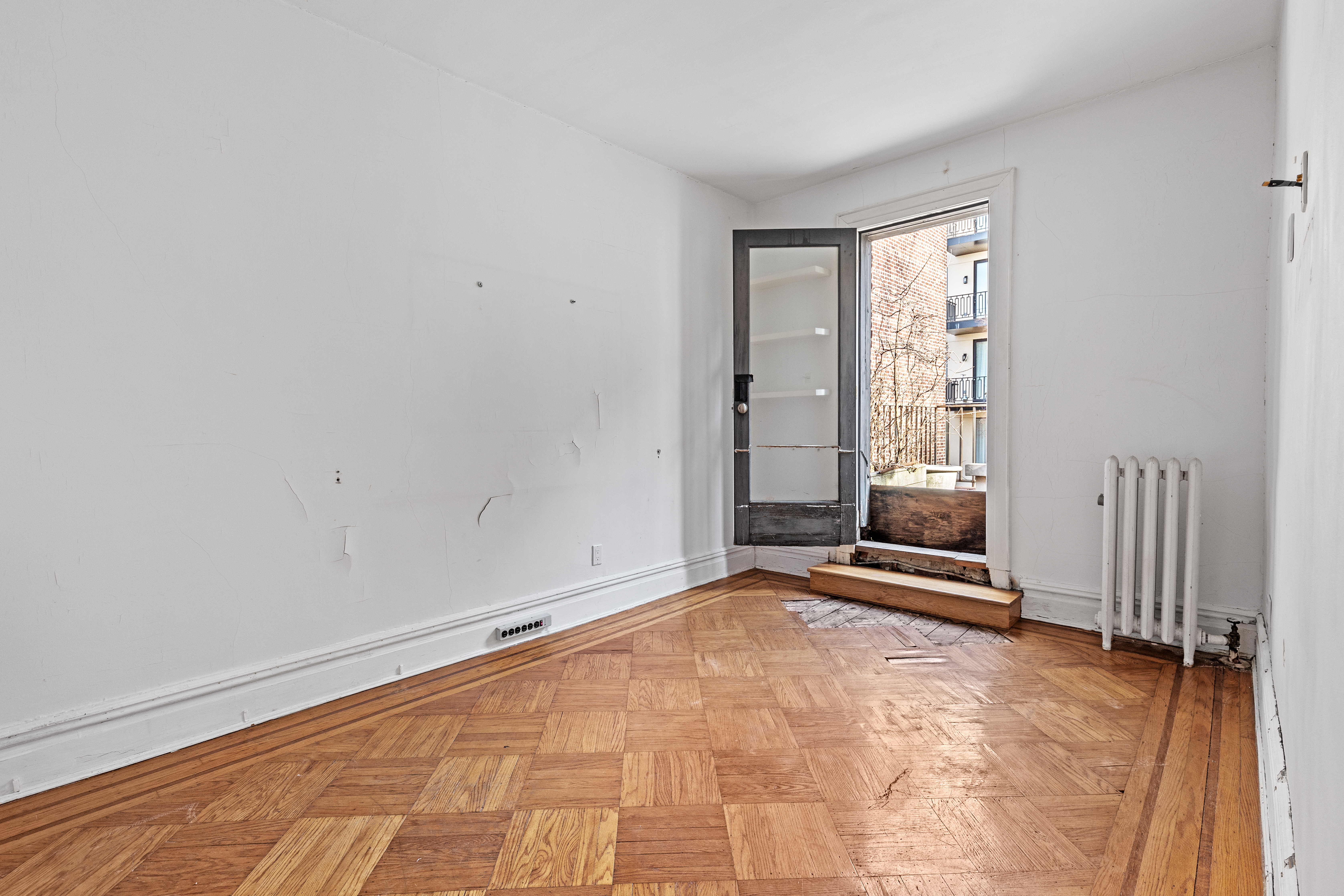 555 16th Street Brooklyn, NY 11215 - Photo 13 of 19 an empty room with windows