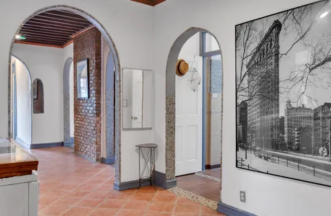 a view of front door and bedroom