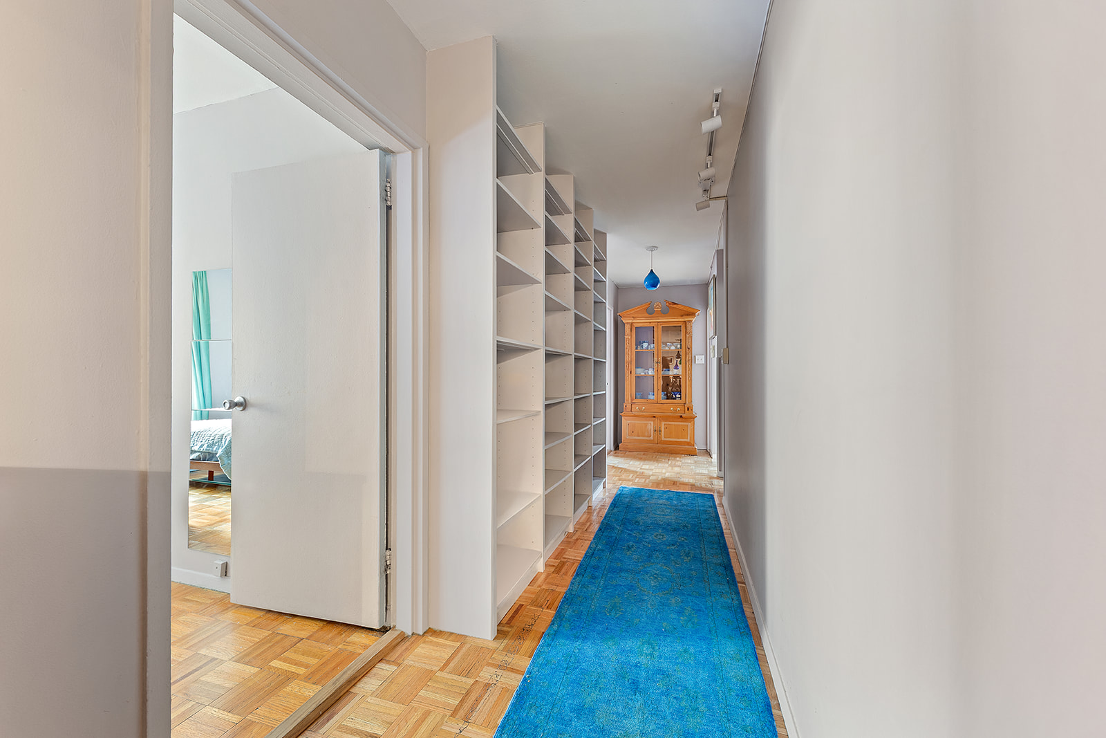 680 Washington Street, Unit 1B Manhattan, NY 10014 - Photo 4 of 13 a view of a hallway with wooden floor and closet
