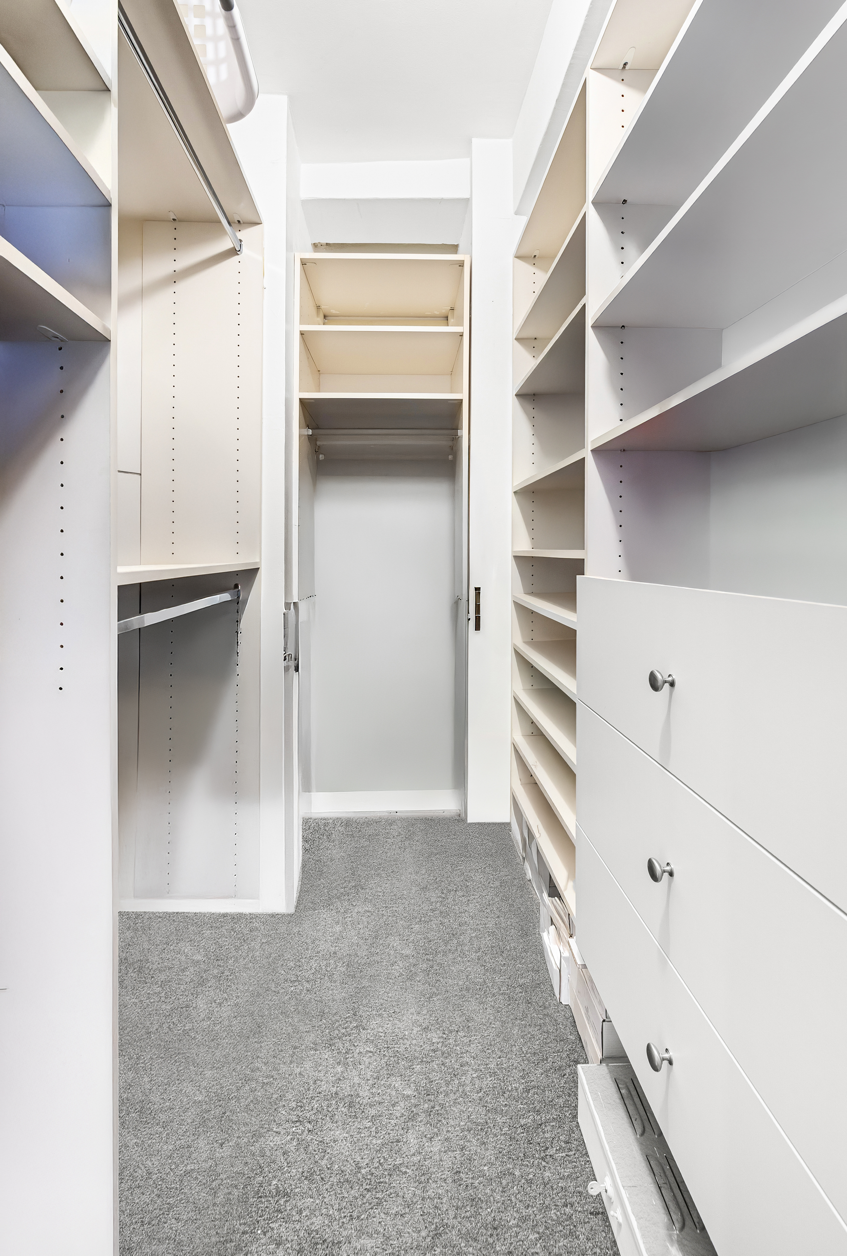 235 East 49th Street, Unit 6G Manhattan, NY 10017 - Photo 17 of 22 a view of an empty walk in closet